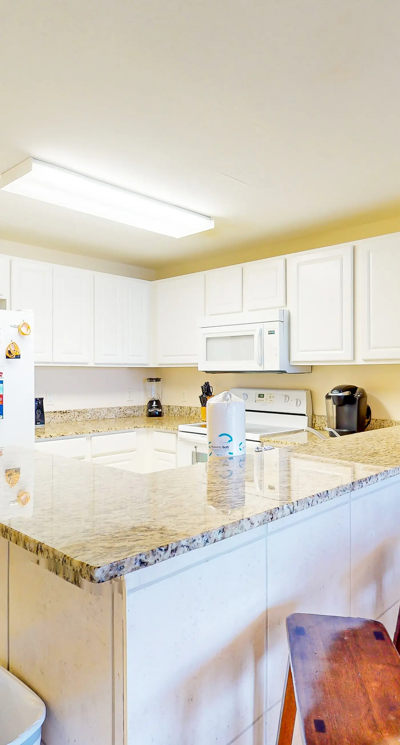 Spacious, waterfront condo with furnished balcony, pools & fitness room