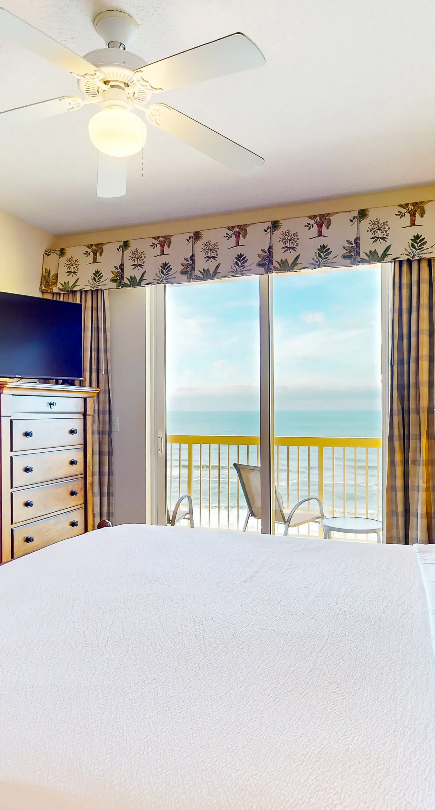 Spacious, waterfront condo with furnished balcony, pools & fitness room