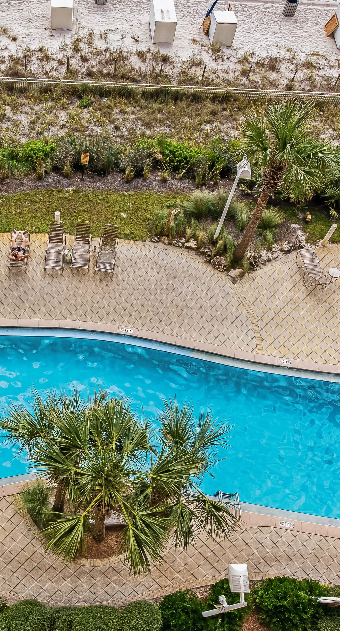 Spacious, waterfront condo with furnished balcony, pools & fitness room