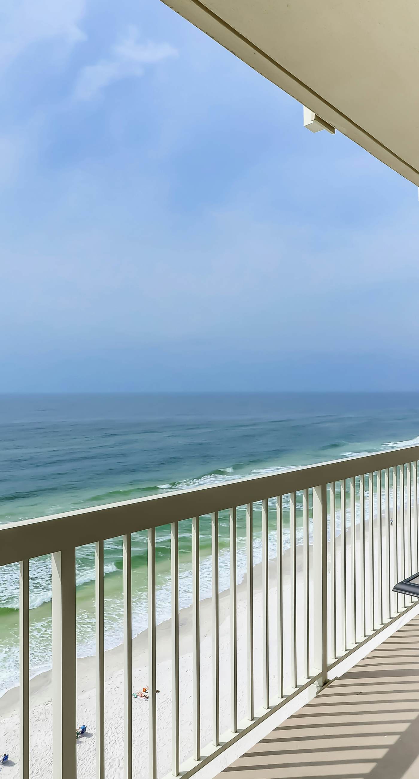 Eclectic gulf front condo with free WiFI, two pools, hot tub, & easy beach access