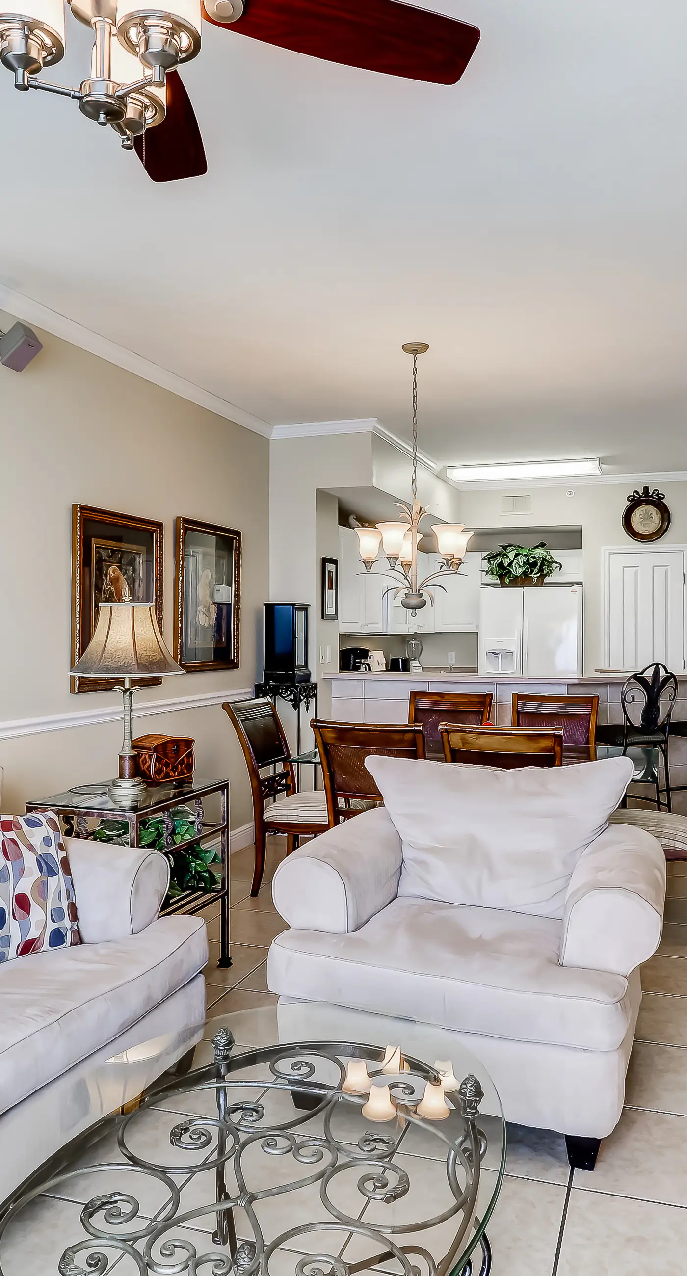 Eclectic gulf front condo with free WiFI, two pools, hot tub, & easy beach access