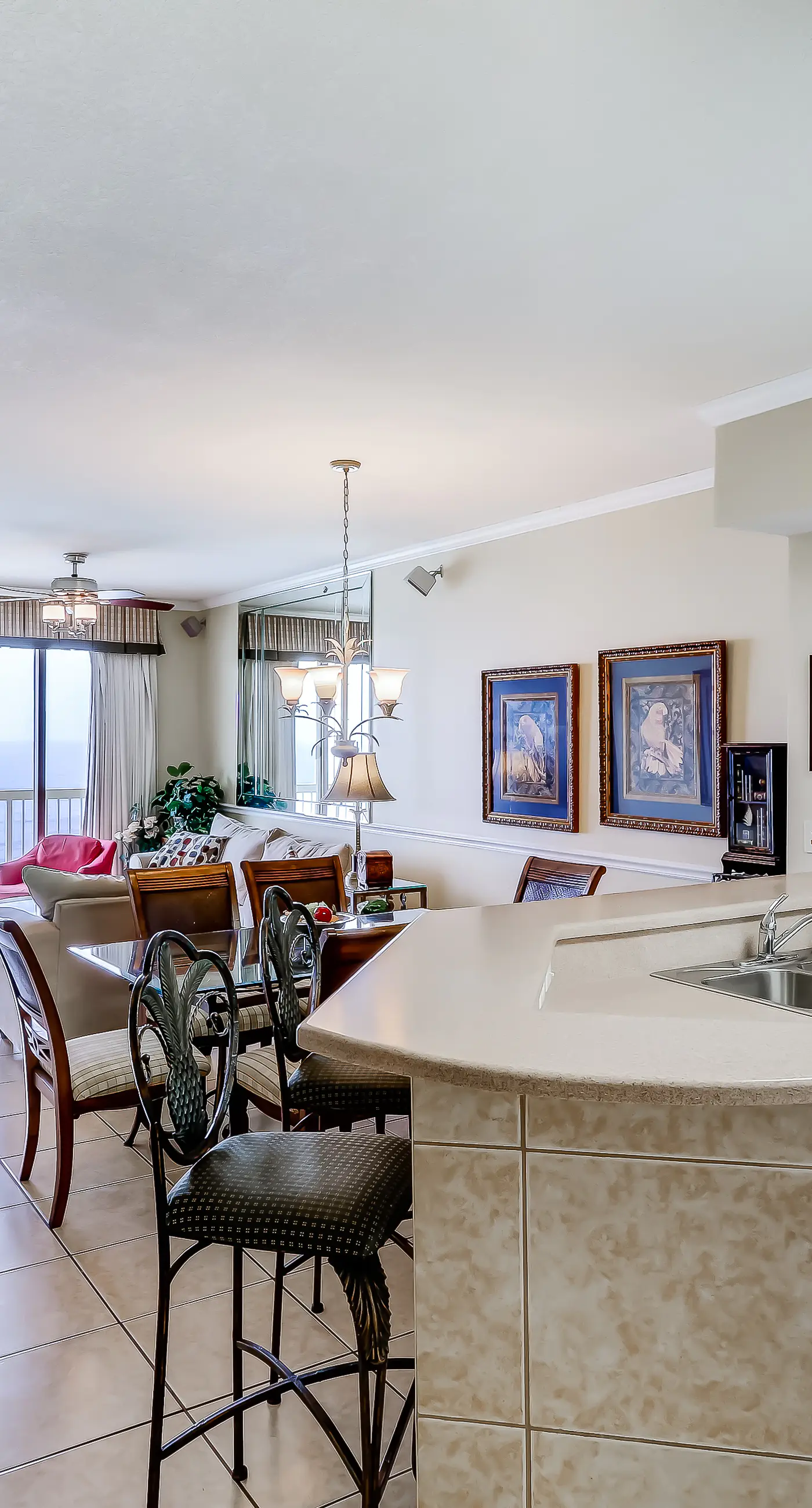 Eclectic gulf front condo with free WiFI, two pools, hot tub, & easy beach access