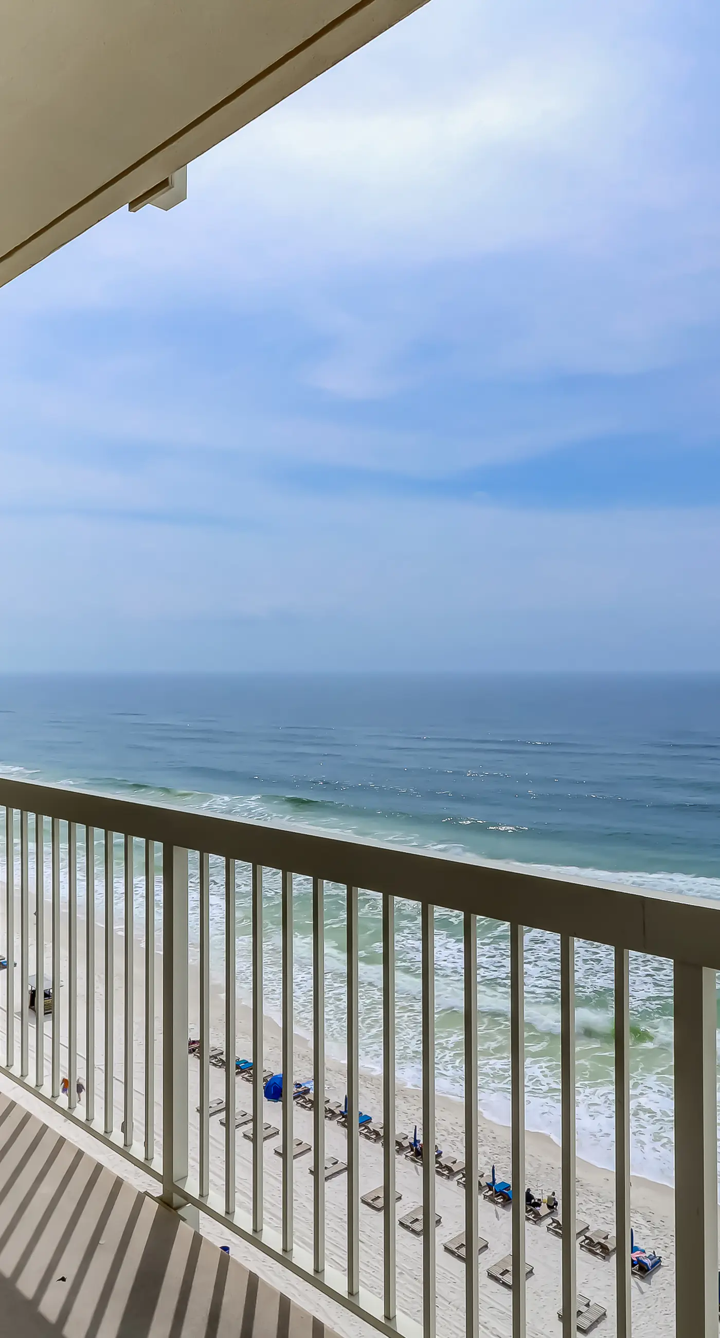 Eclectic gulf front condo with free WiFI, two pools, hot tub, & easy beach access