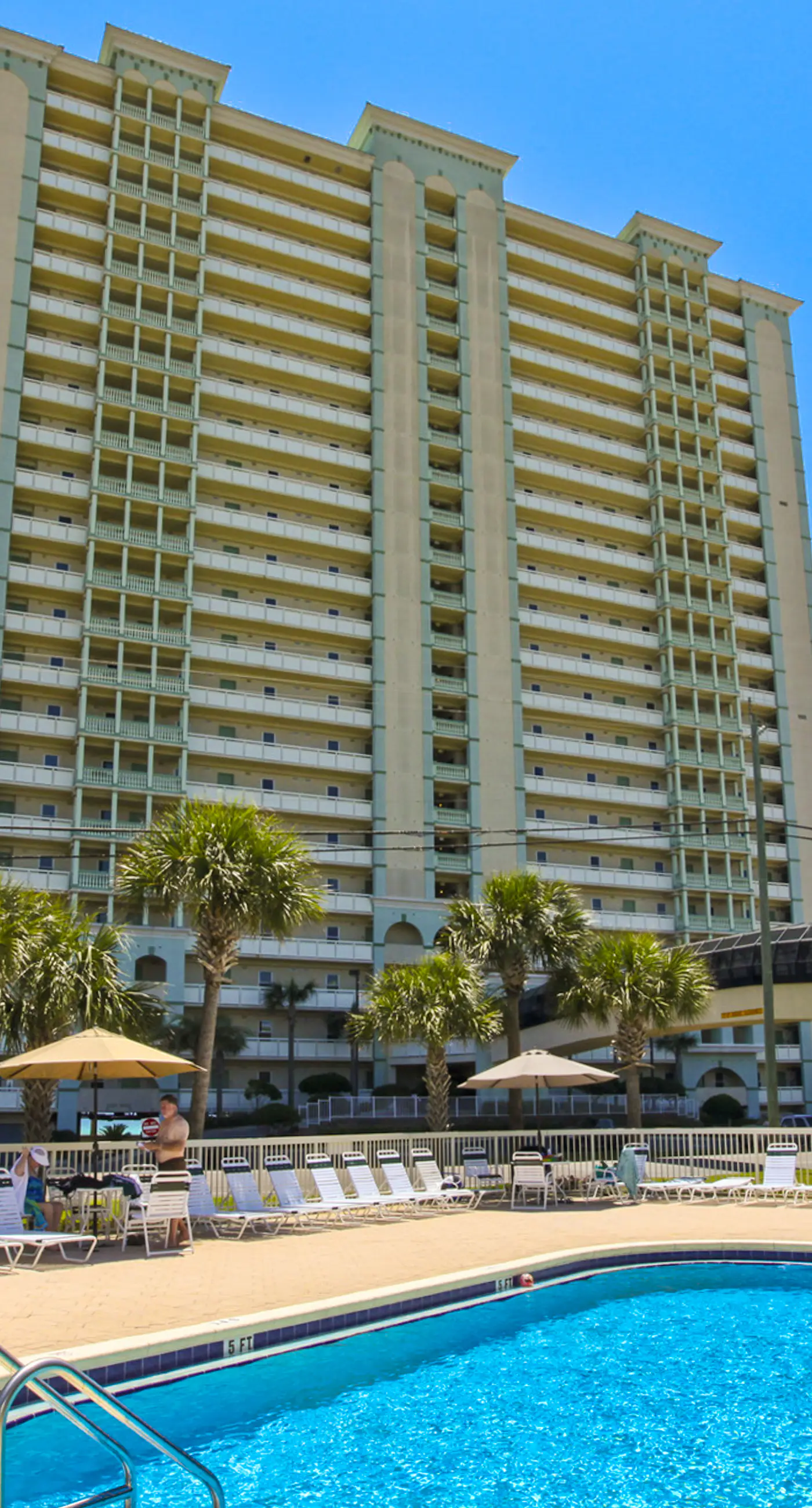 Eclectic gulf front condo with free WiFI, two pools, hot tub, & easy beach access