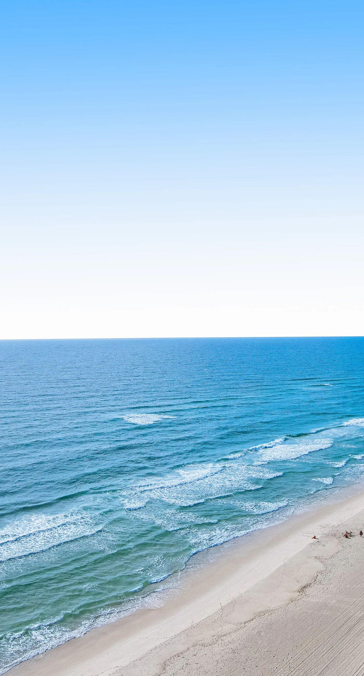 Sunny oceanfront condo w/ two shared pools, hot tub - walk to the beach