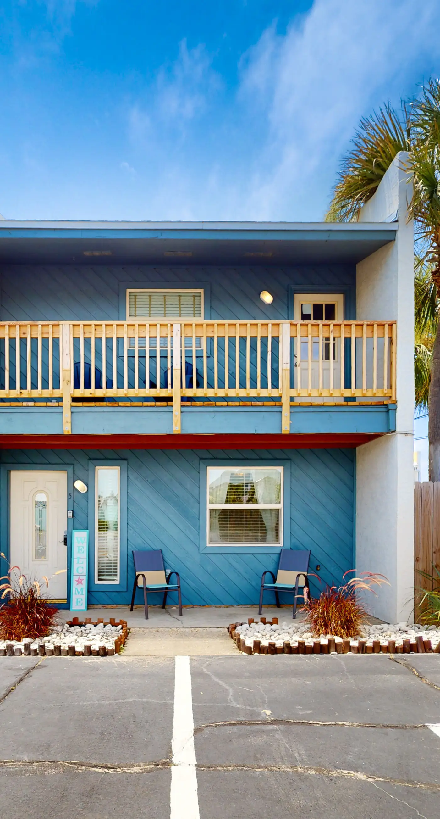 Dog-friendly condo with pool, balcony, beach access, central AC, & W&D