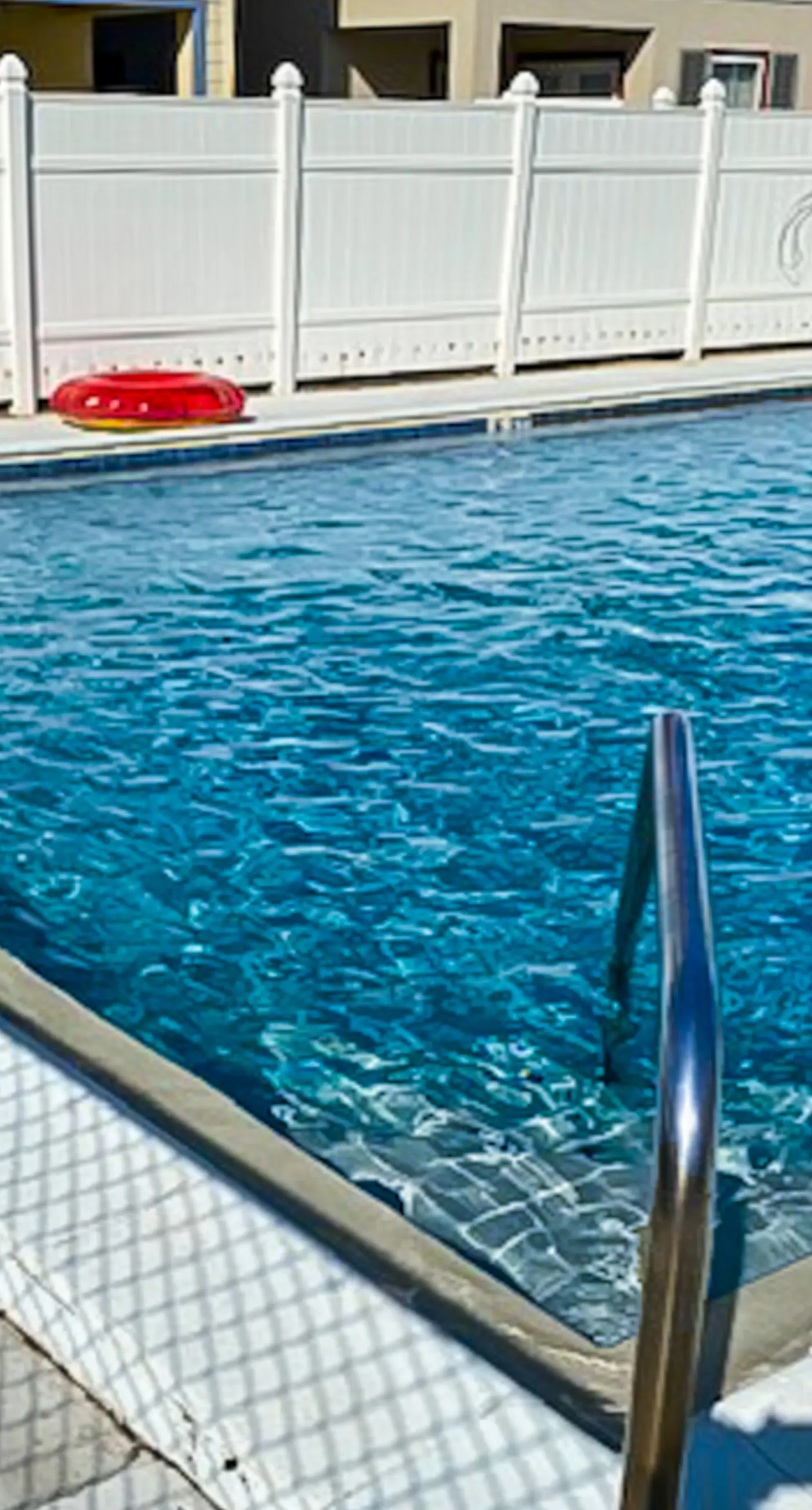 Dog-friendly condo with pool, balcony, beach access, central AC, & W&D