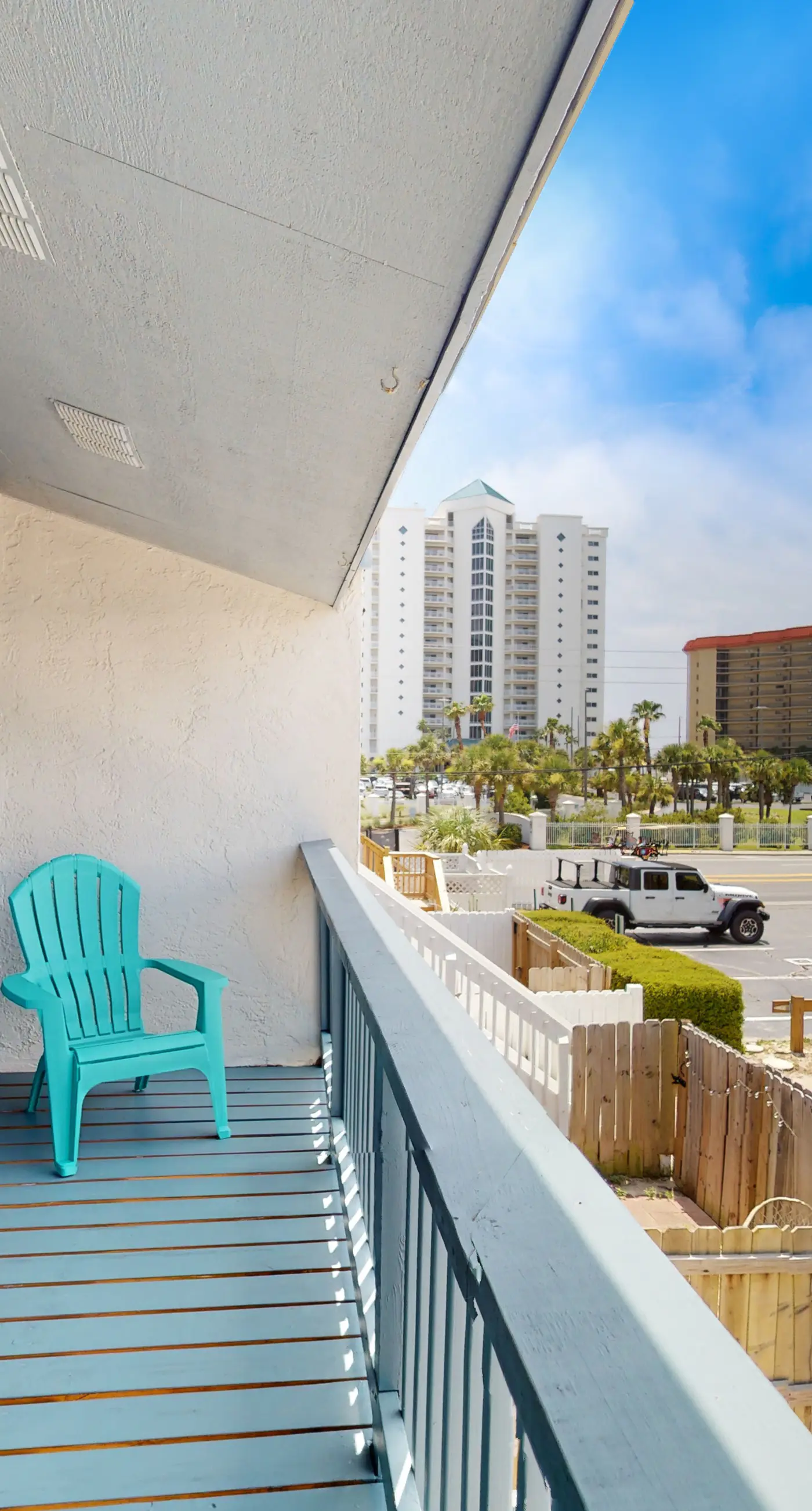 Dog-friendly condo with pool, balcony, beach access, central AC, & W&D