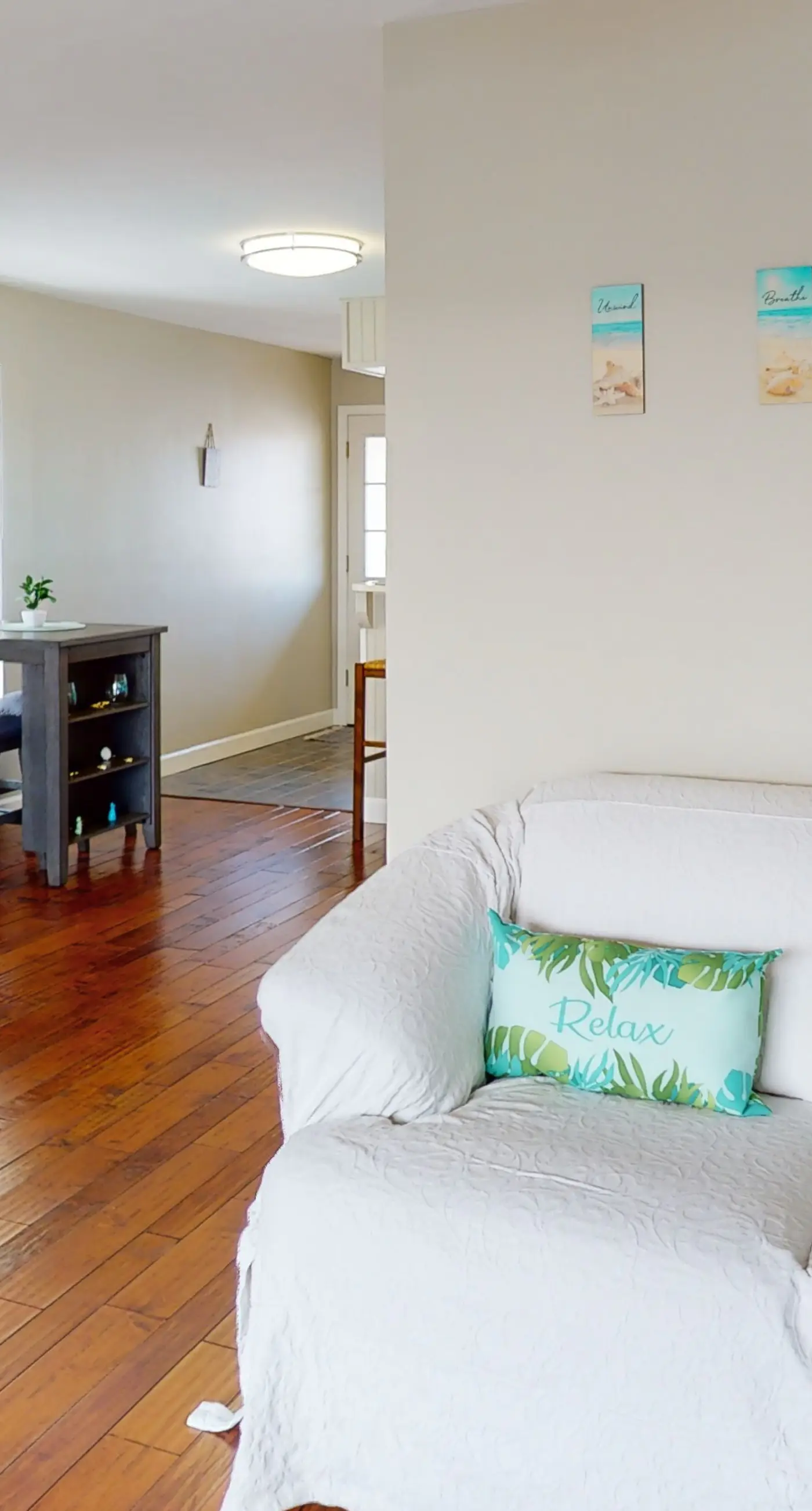 Dog-friendly condo with pool, balcony, beach access, central AC, & W&D