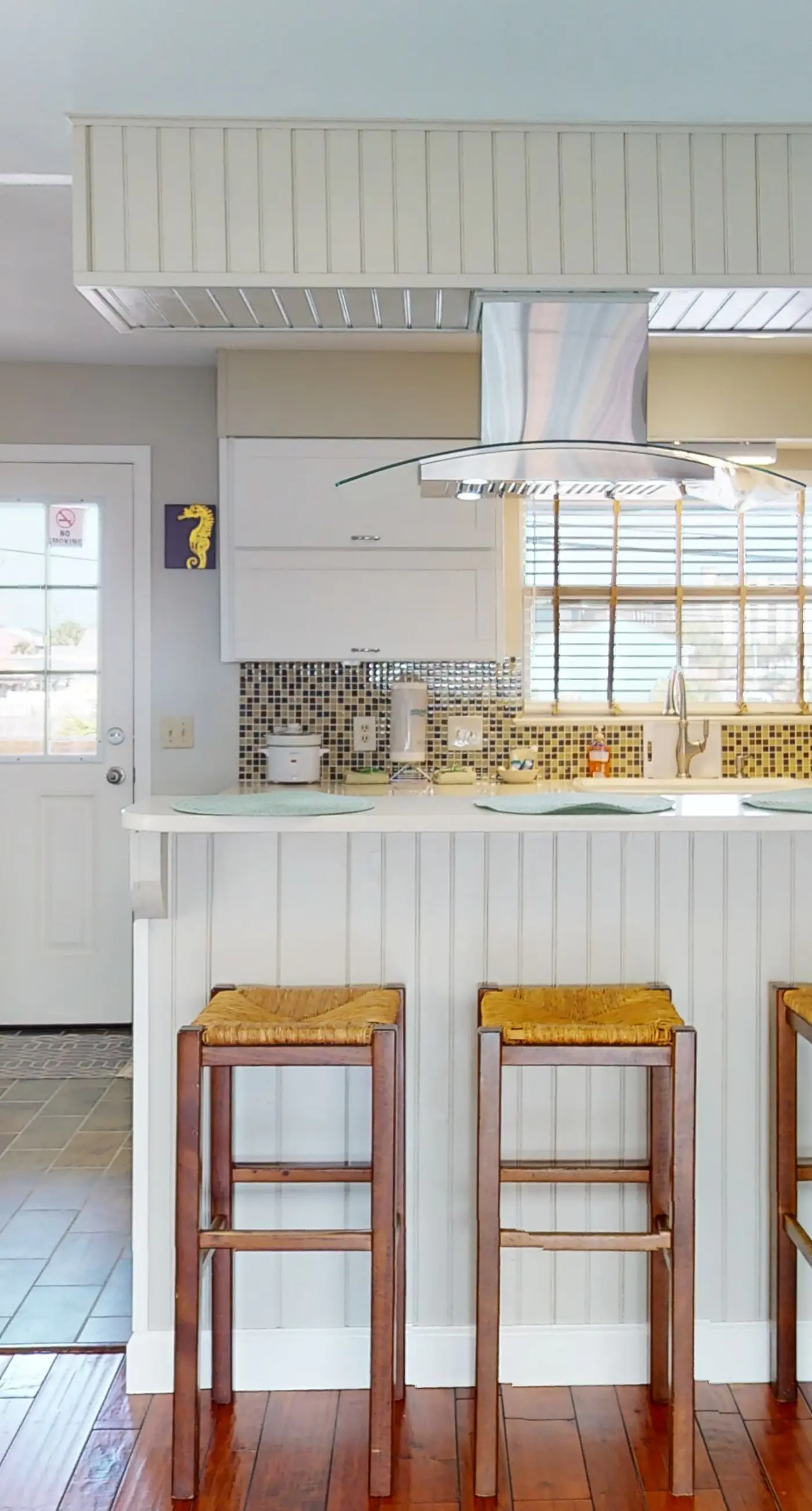 Dog-friendly condo with pool, balcony, beach access, central AC, & W&D