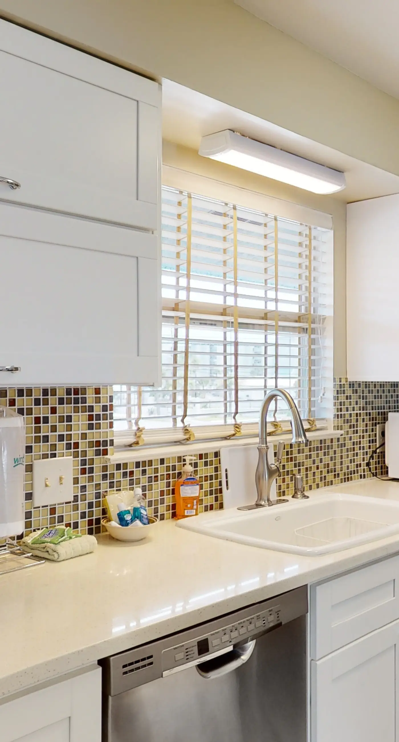 Dog-friendly condo with pool, balcony, beach access, central AC, & W&D