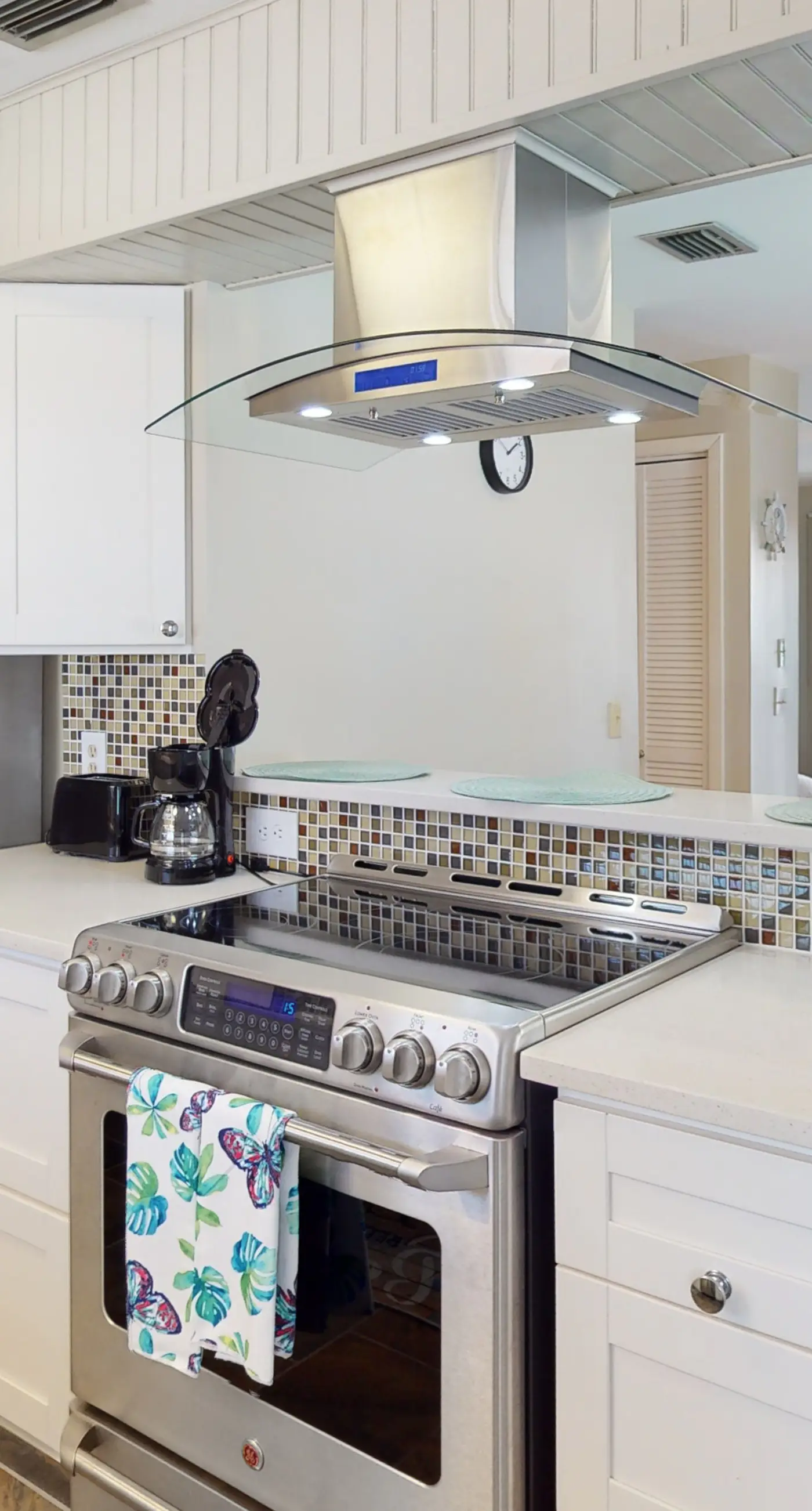 Dog-friendly condo with pool, balcony, beach access, central AC, & W&D