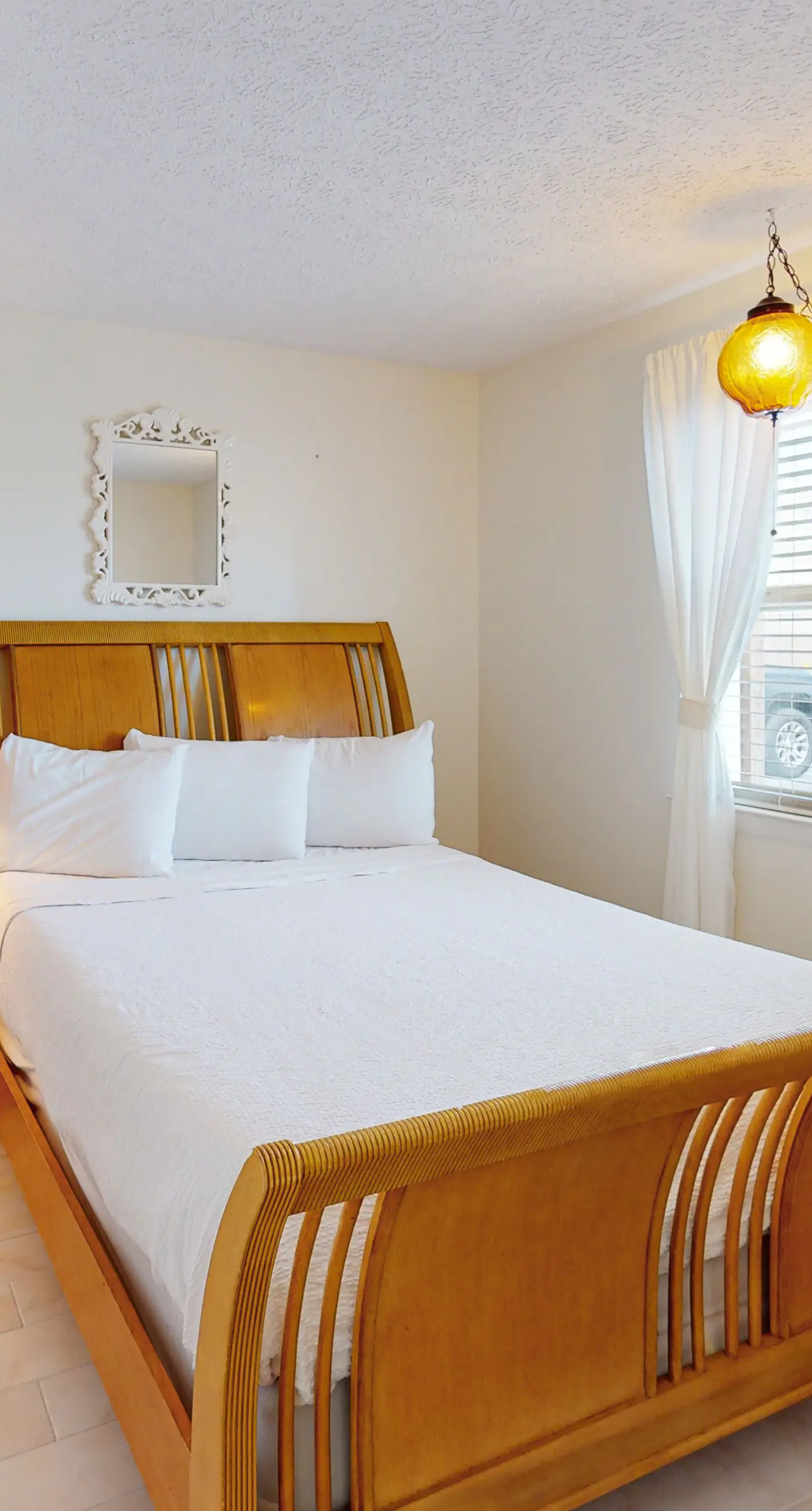 Dog-friendly condo with pool, balcony, beach access, central AC, & W&D