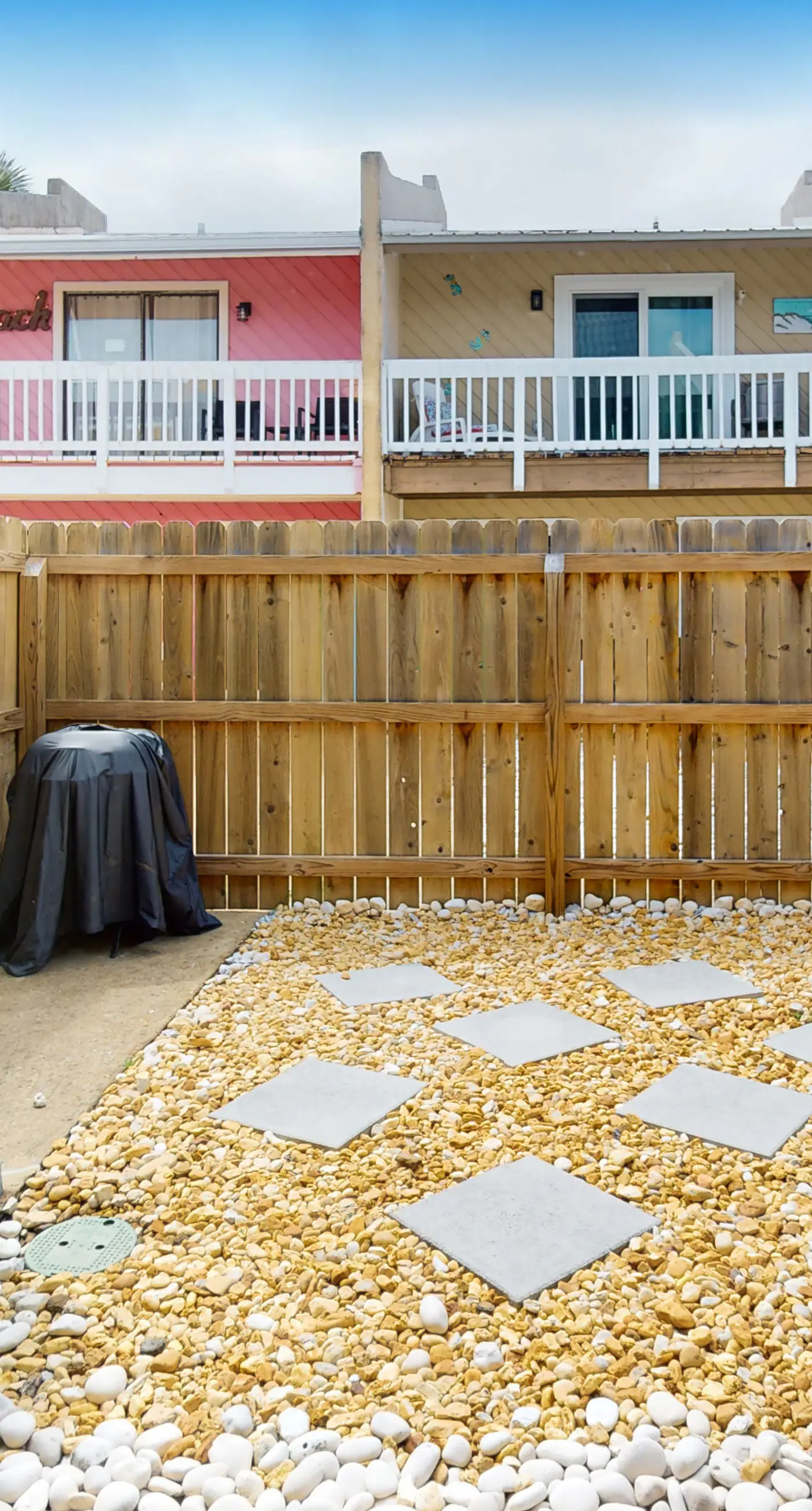 Dog-friendly condo with pool, balcony, beach access, central AC, & W&D