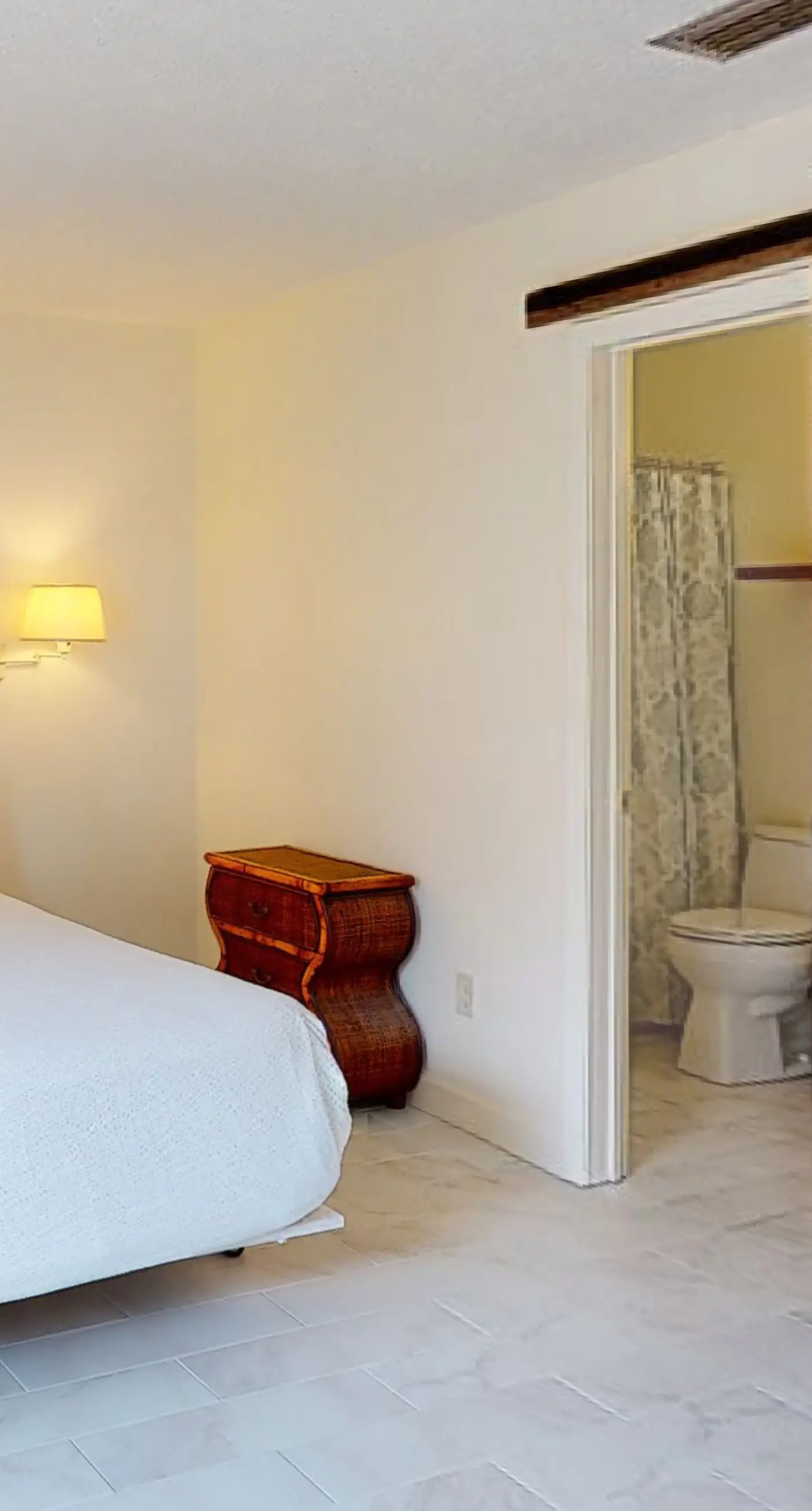 Dog-friendly condo with pool, balcony, beach access, central AC, & W&D