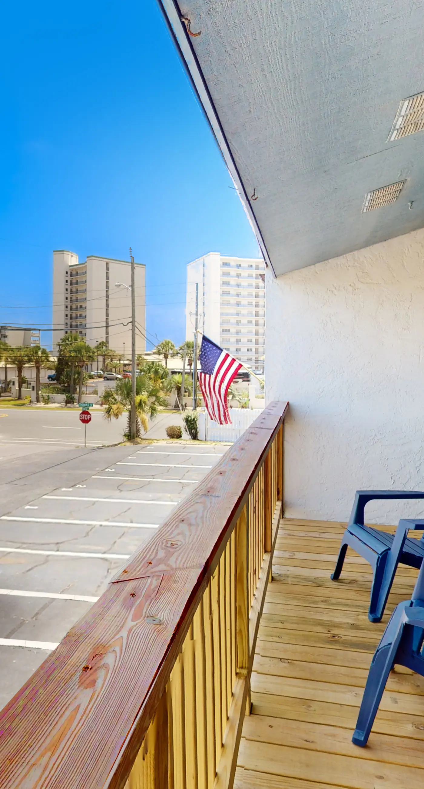 Dog-friendly condo with pool, balcony, beach access, central AC, & W&D