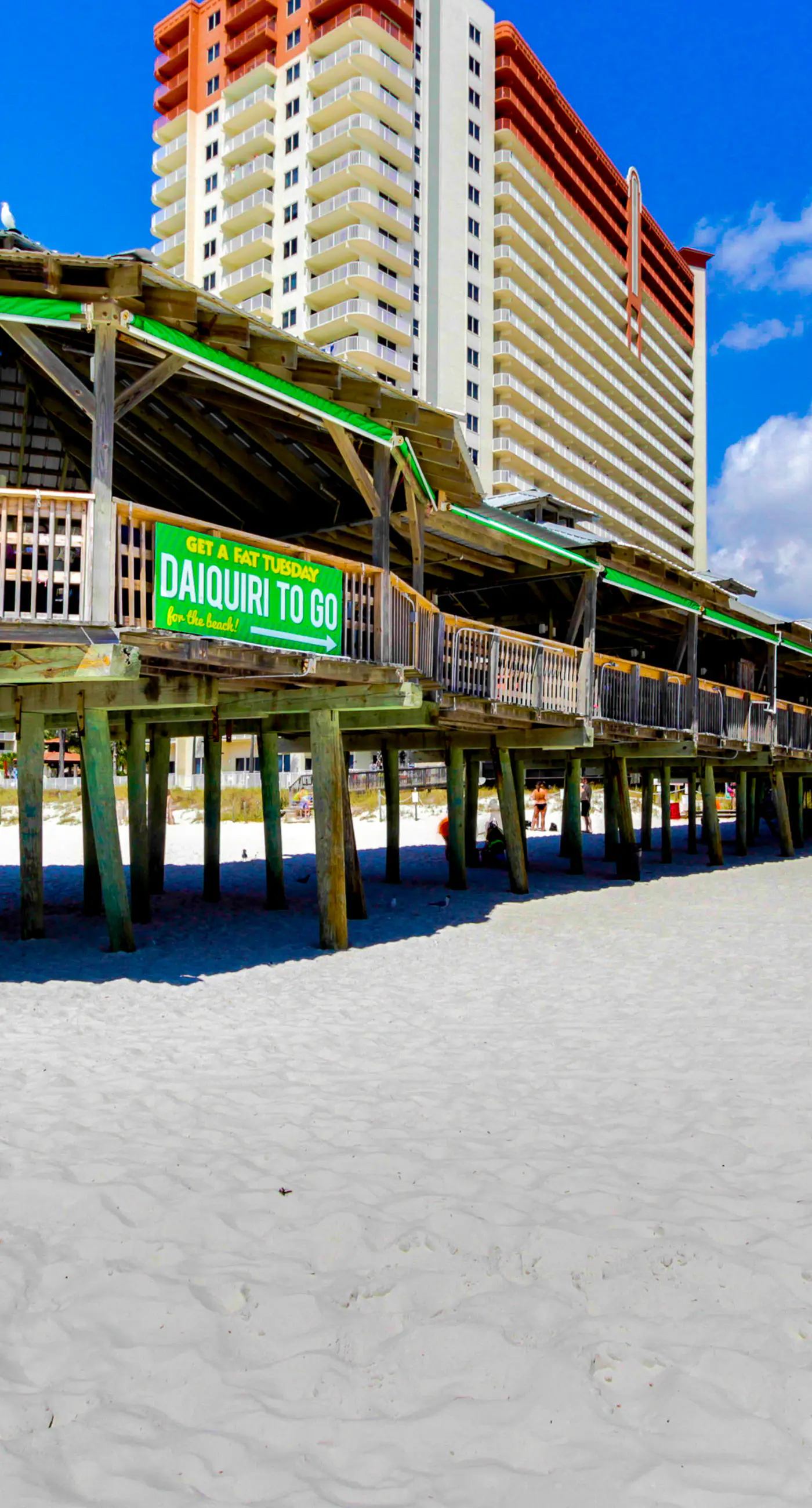 Dog-friendly condo with pool, balcony, beach access, central AC, & W&D