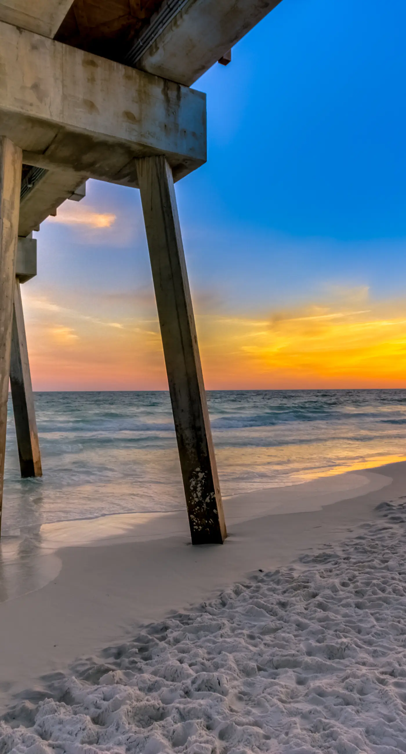 Dog-friendly condo with pool, balcony, beach access, central AC, & W&D