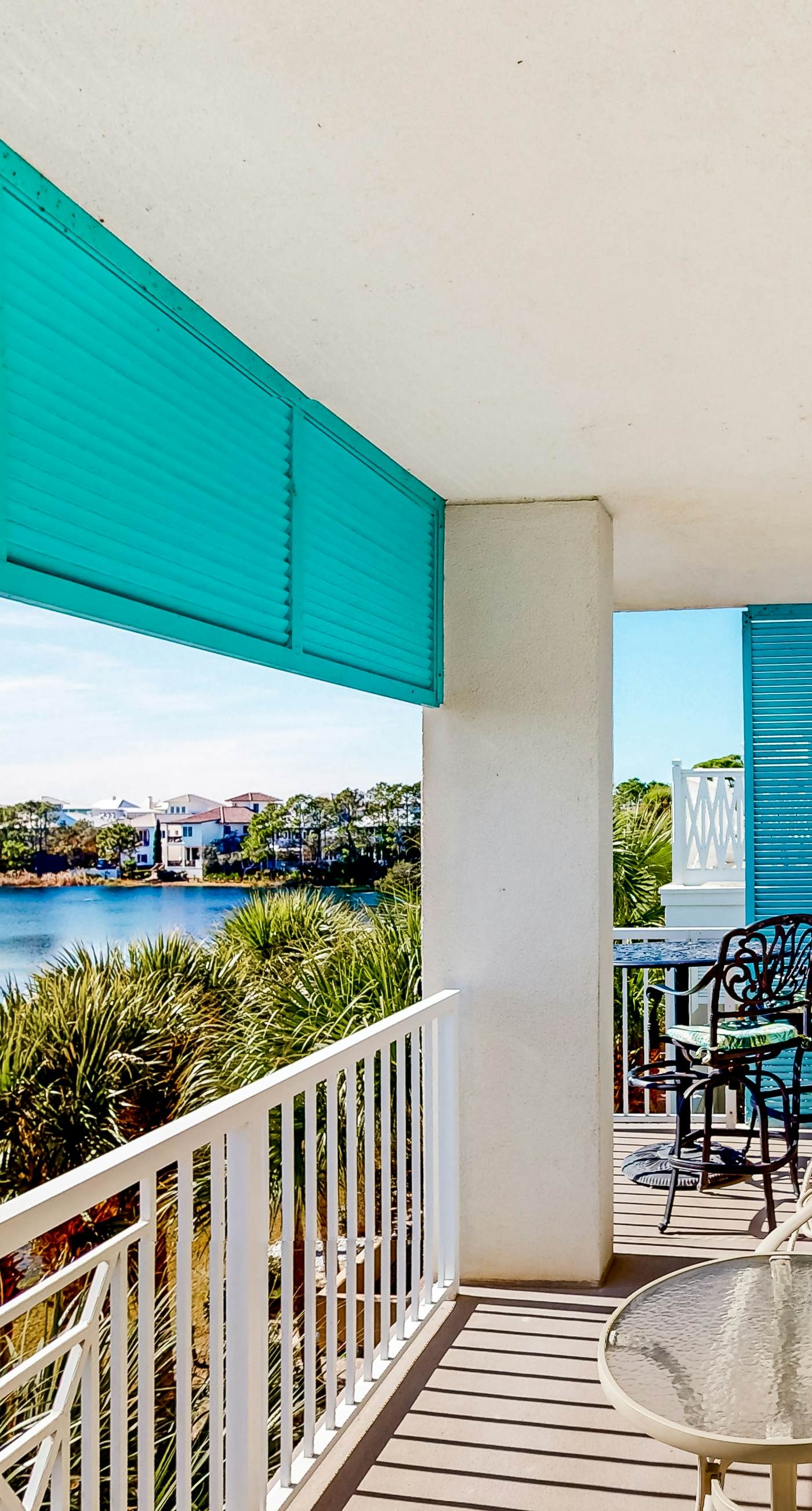 Sunset-view dog-friendly condo w/ balcony overlooking water, beach access, pool & hot tub