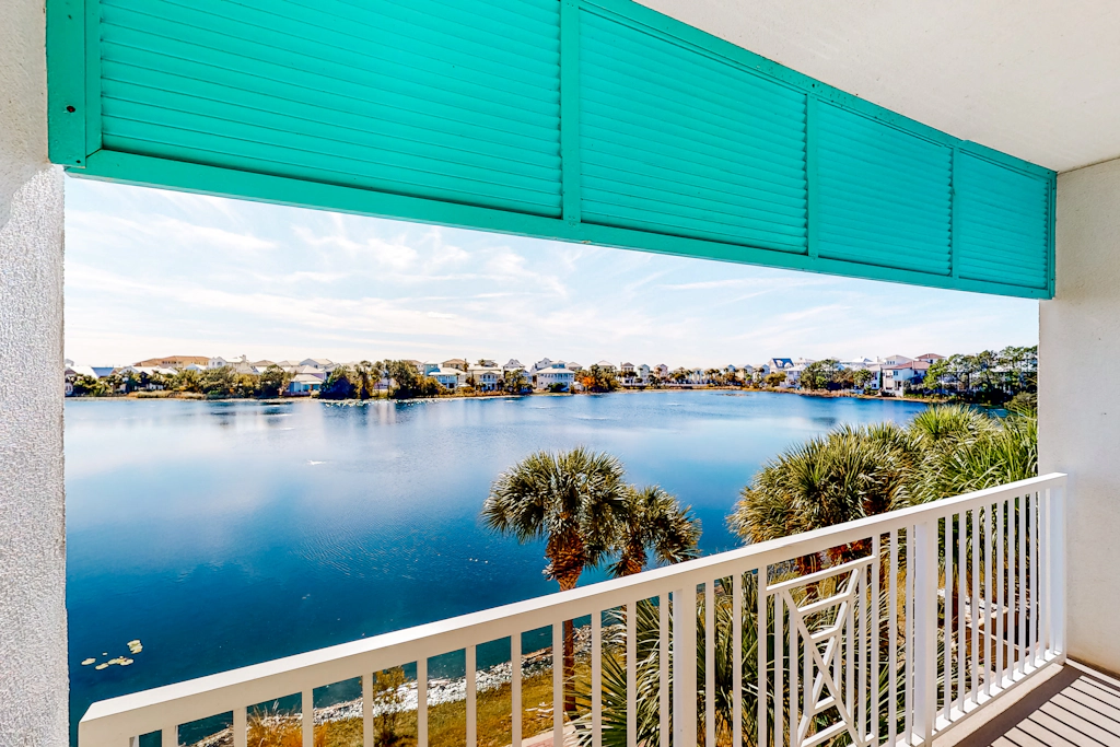 Sunset-view dog-friendly condo w/ balcony overlooking water, beach access, pool & hot tub
