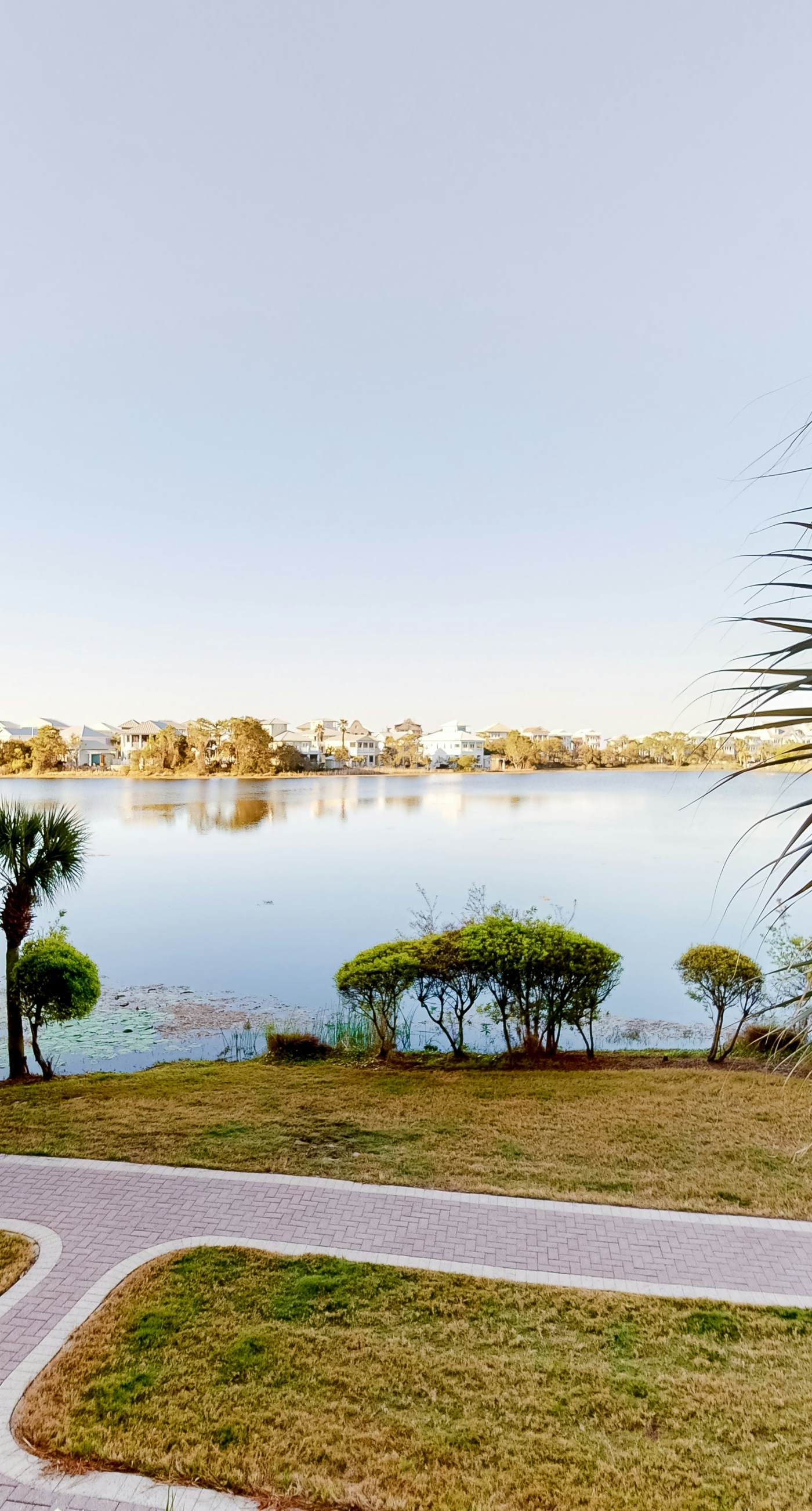 Sunset-view dog-friendly condo w/ balcony overlooking water, beach access, pool & hot tub