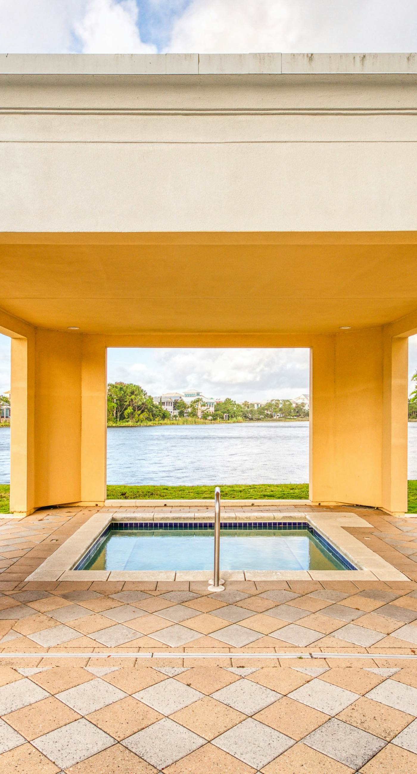 Sunset-view dog-friendly condo w/ balcony overlooking water, beach access, pool & hot tub