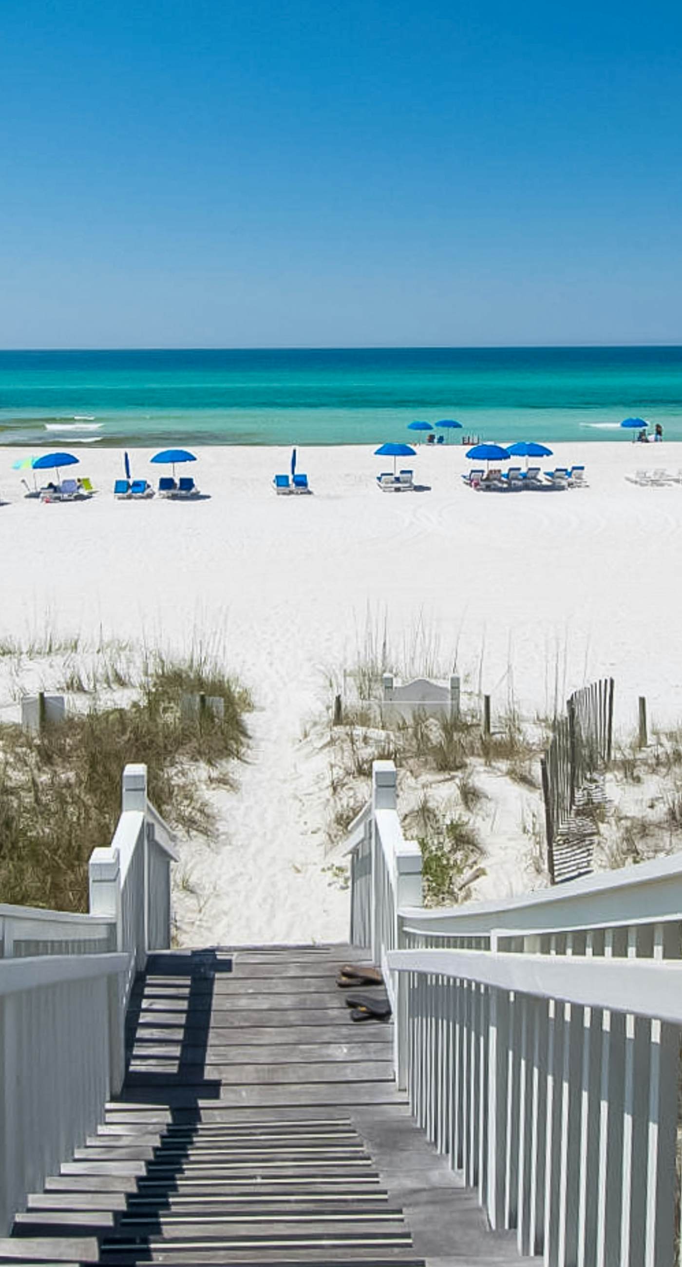 Sunset-view dog-friendly condo w/ balcony overlooking water, beach access, pool & hot tub