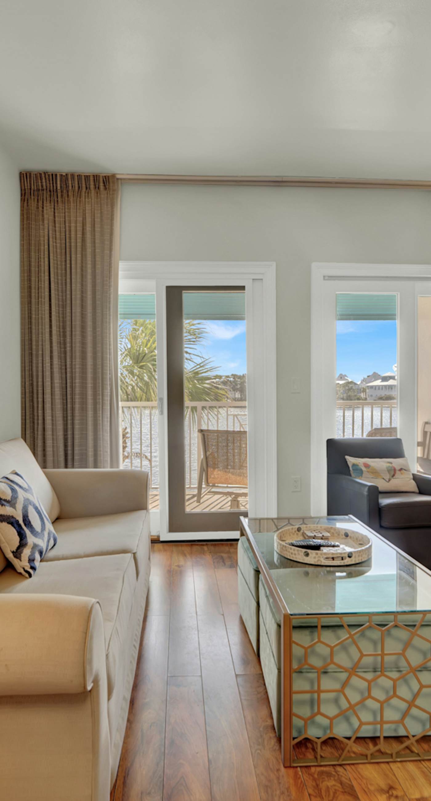 Stunning lake-view condo with private balcony, pools, hot tub, & private beach