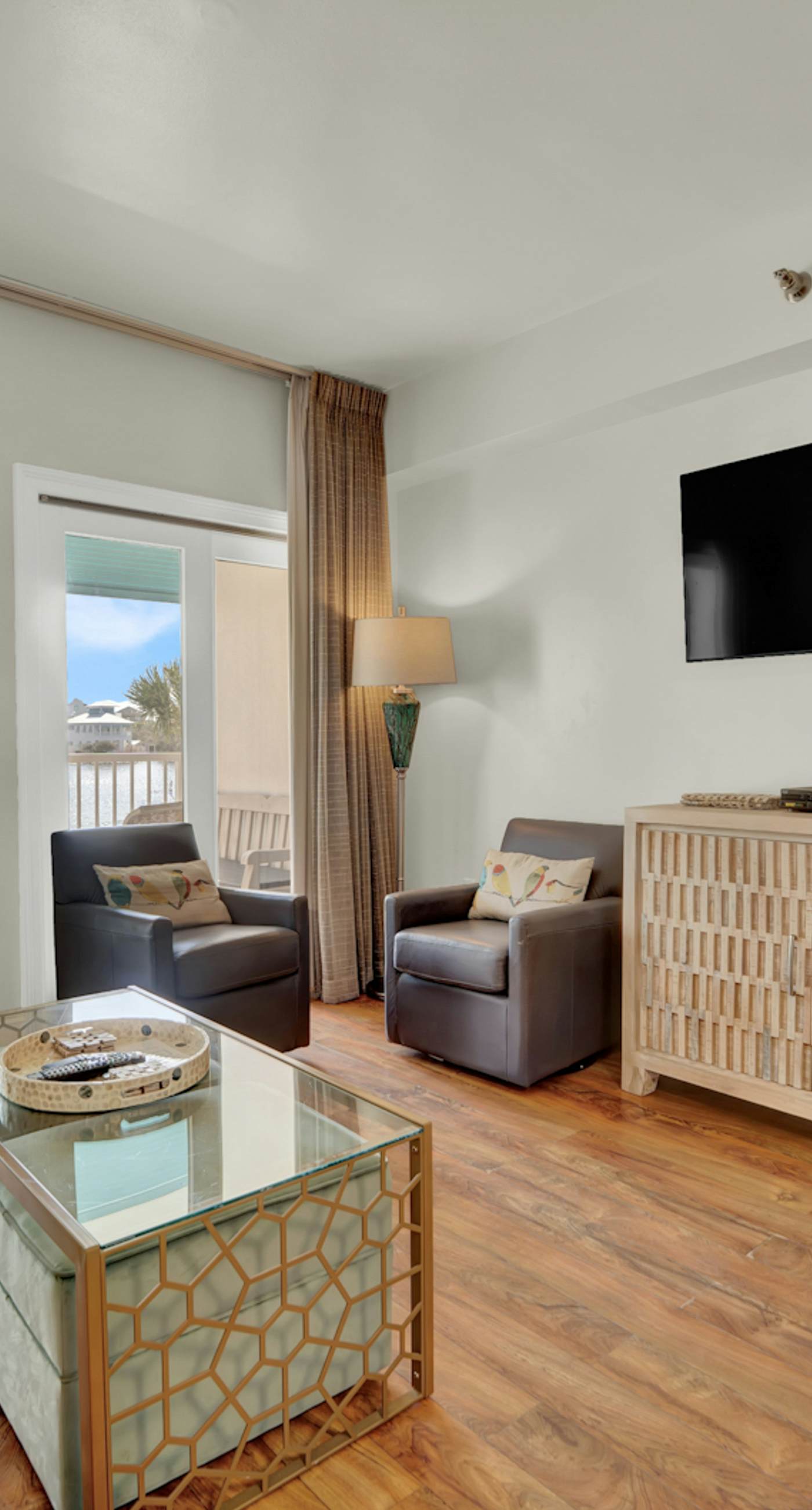 Stunning lake-view condo with private balcony, pools, hot tub, & private beach