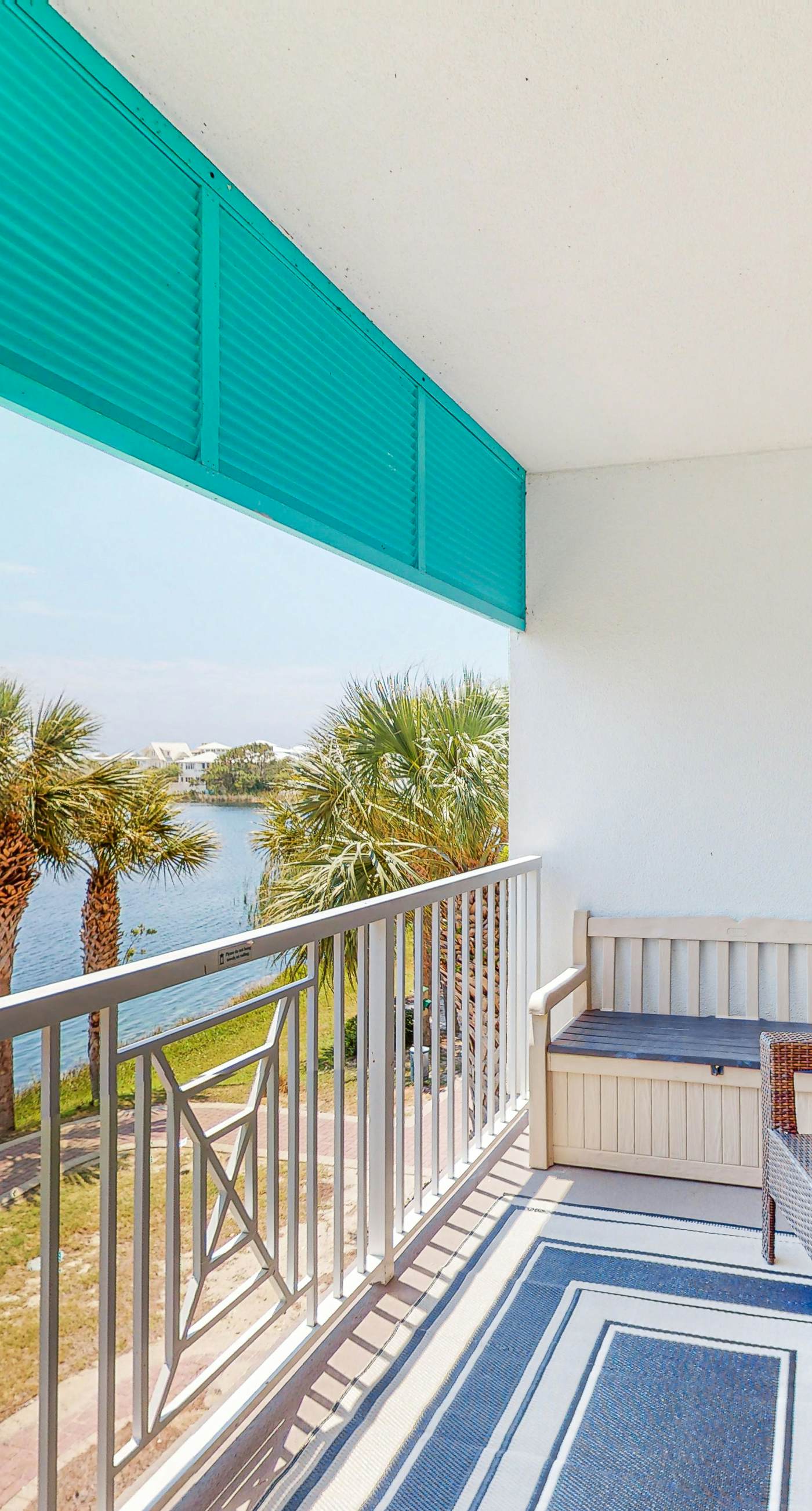 Stunning lake-view condo with private balcony, pools, hot tub, & private beach