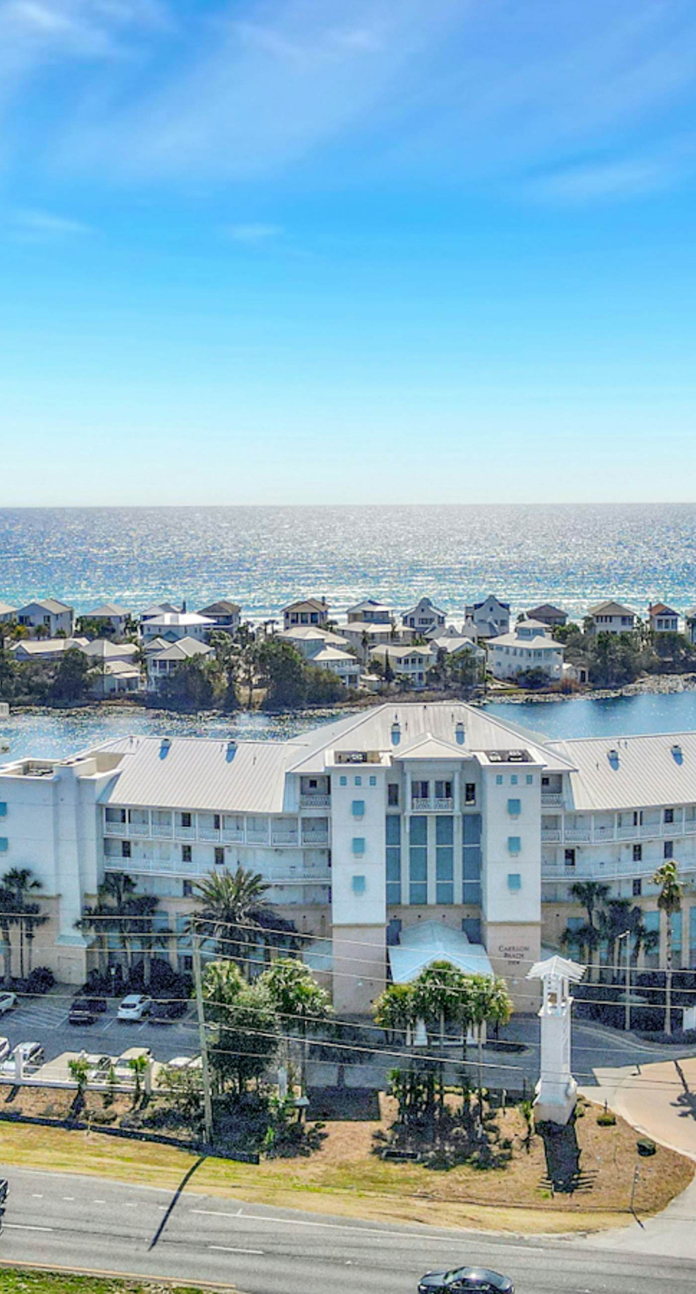 Stunning lake-view condo with private balcony, pools, hot tub, & private beach