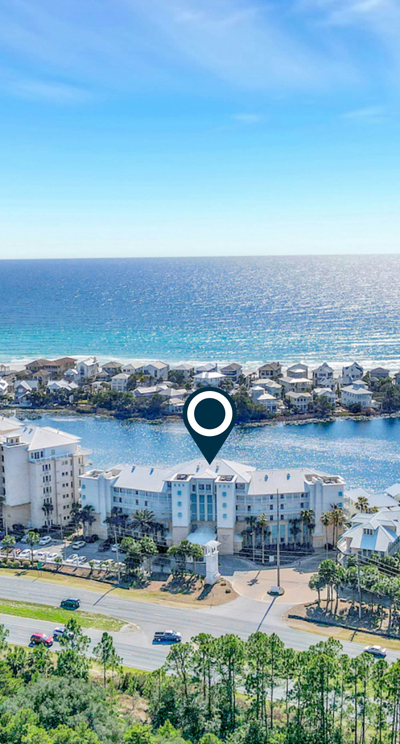 Stunning lake-view condo with private balcony, pools, hot tub, & private beach