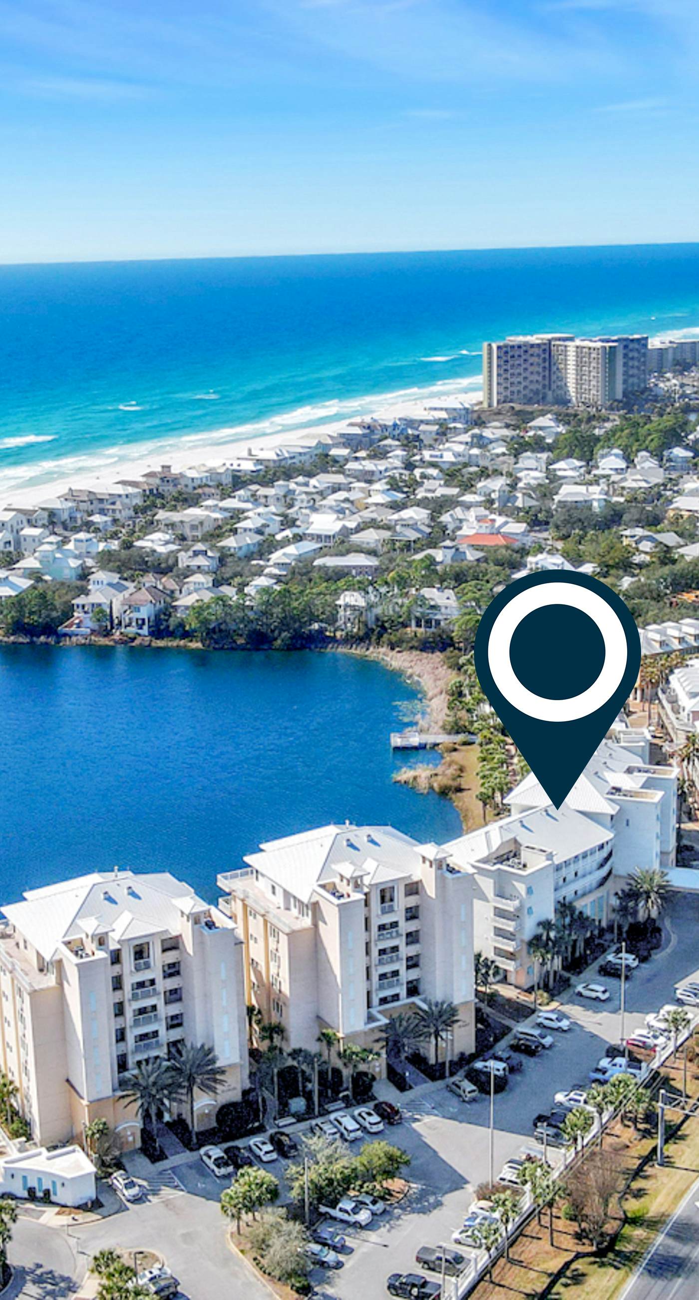 Stunning lake-view condo with private balcony, pools, hot tub, & private beach