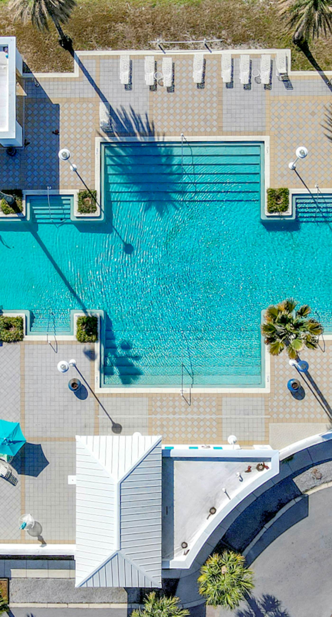 Stunning lake-view condo with private balcony, pools, hot tub, & private beach