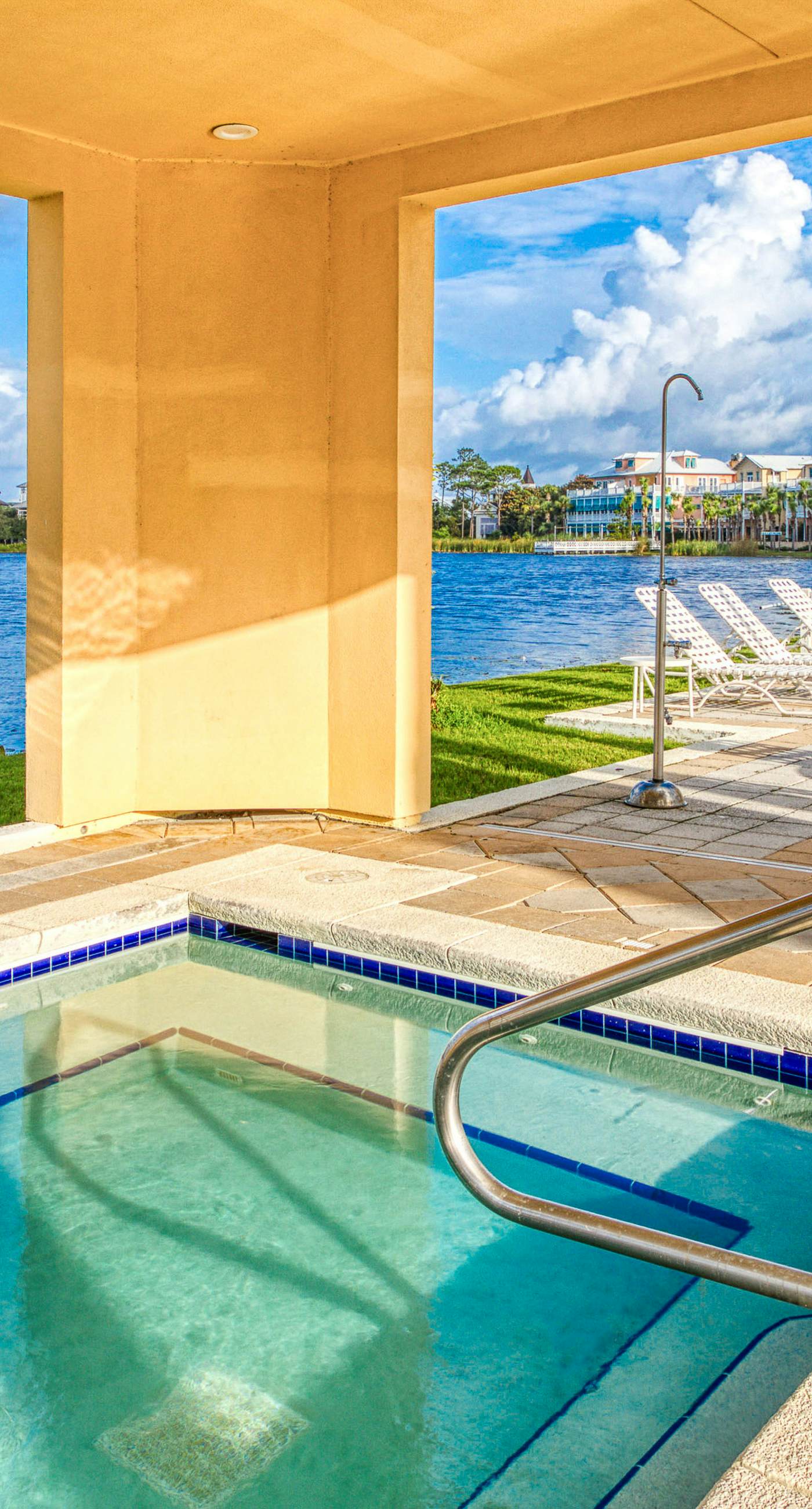Stunning lake-view condo with private balcony, pools, hot tub, & private beach