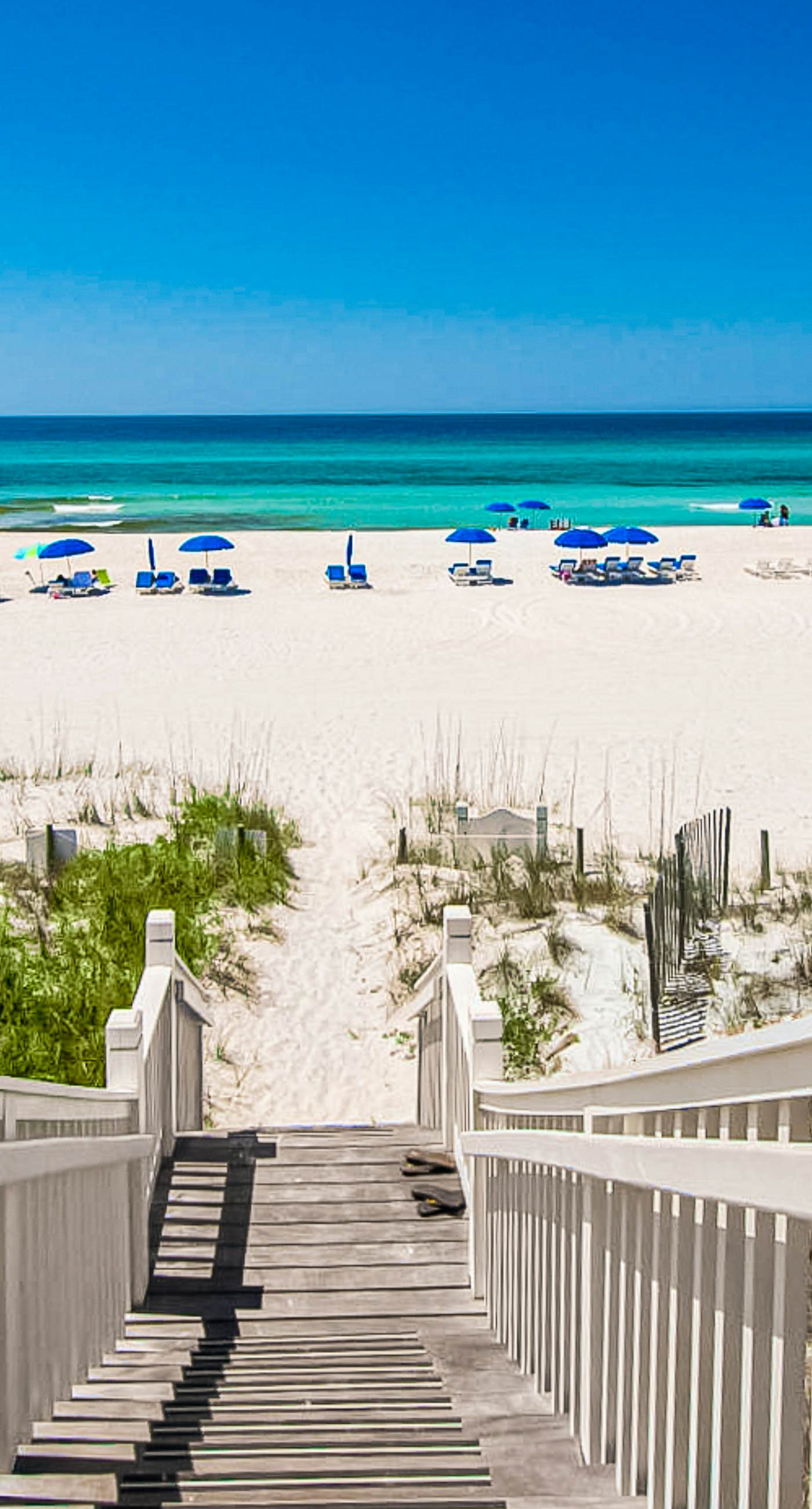 Stunning lake-view condo with private balcony, pools, hot tub, & private beach