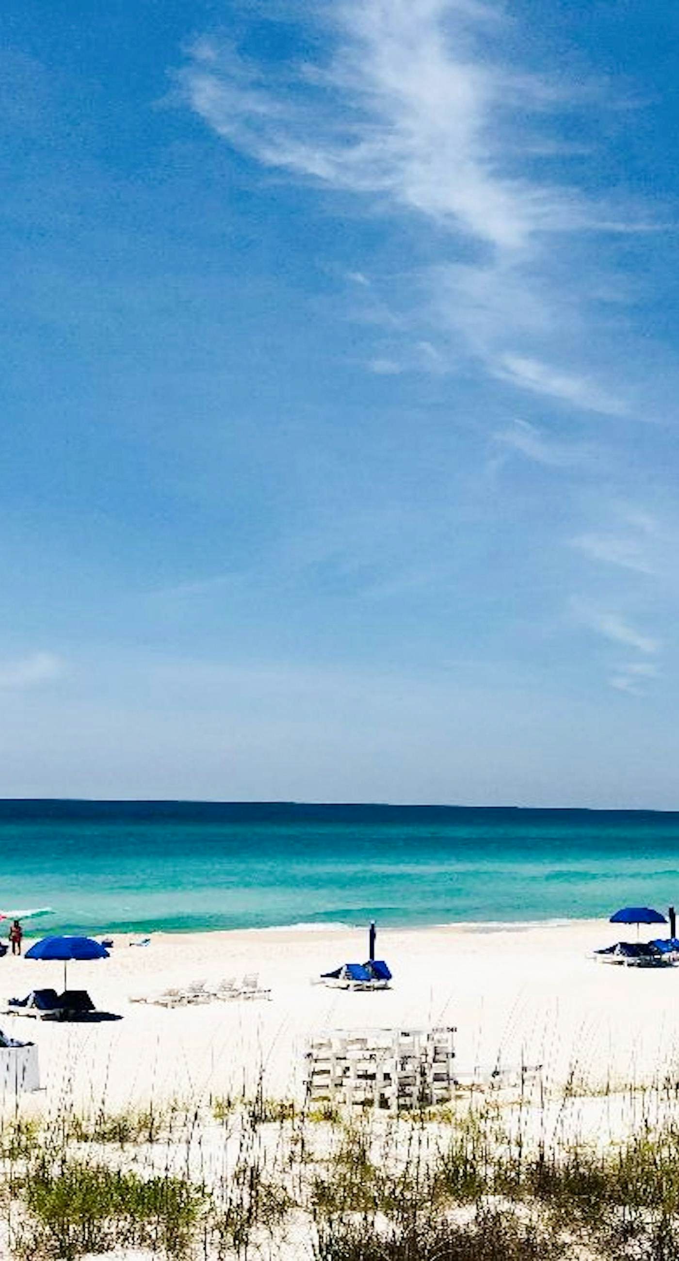 Stunning lake-view condo with private balcony, pools, hot tub, & private beach