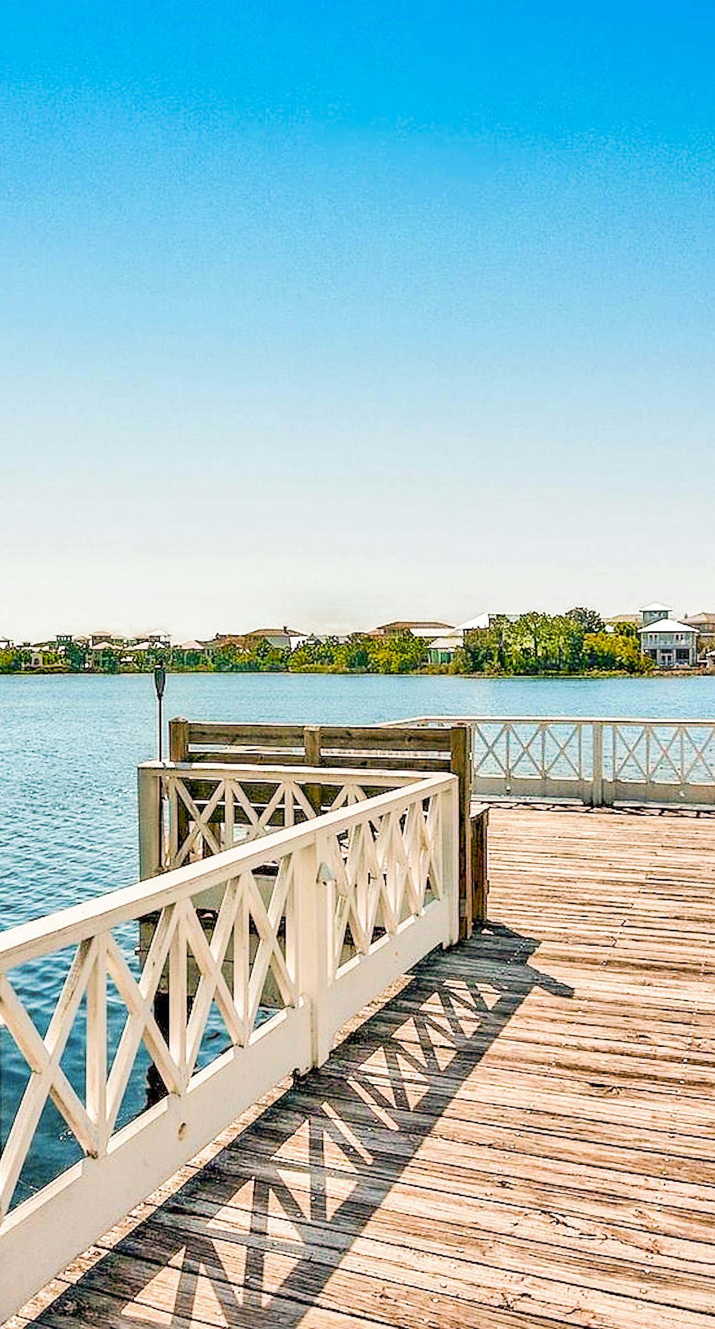 Stunning lake-view condo with private balcony, pools, hot tub, & private beach