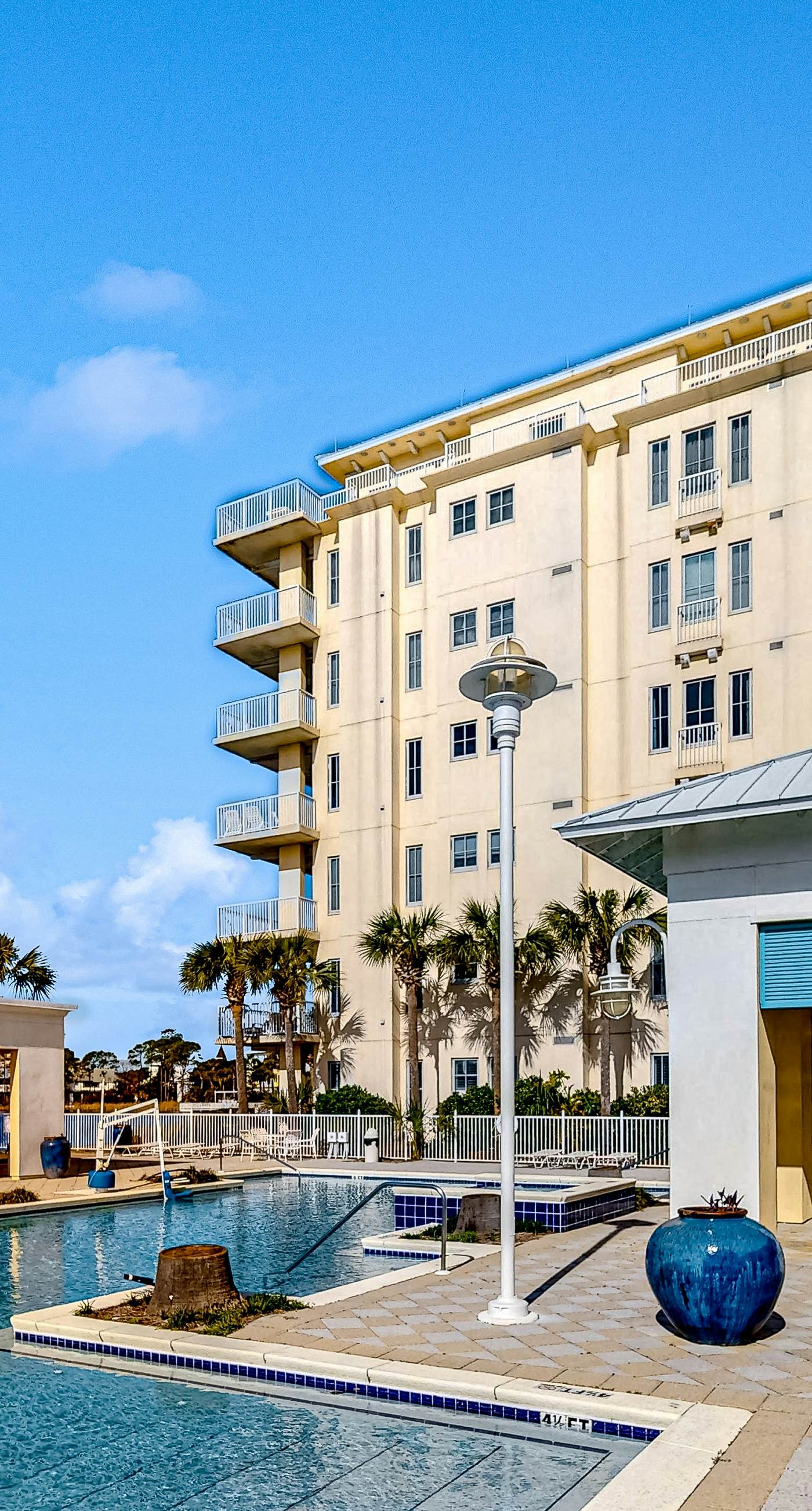 Lakefront resort condo with heated outdoor pool, hot tub, balcony, lake views