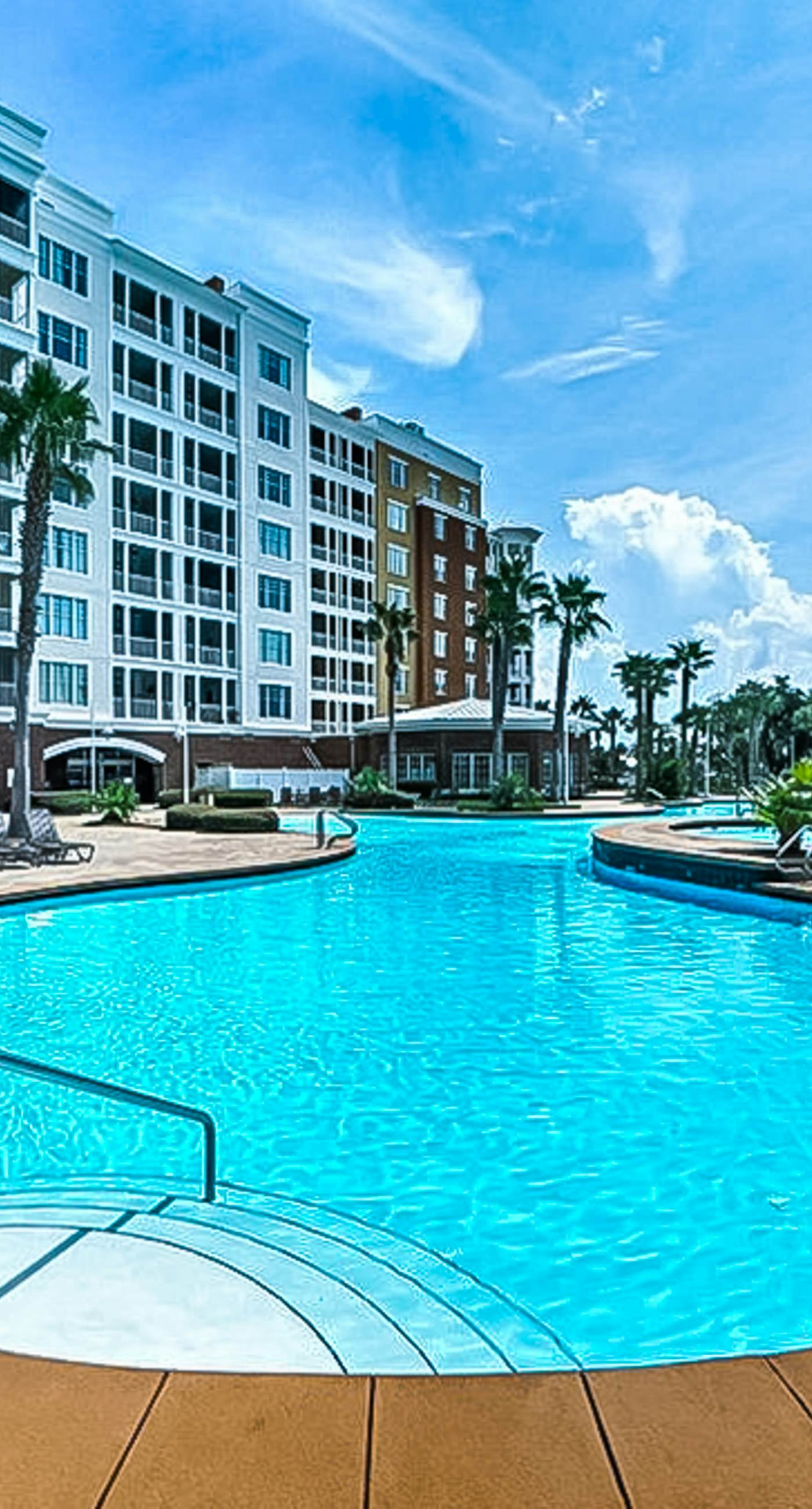 Waterfront Snowbird retreat with private balcony & pool - near the beach