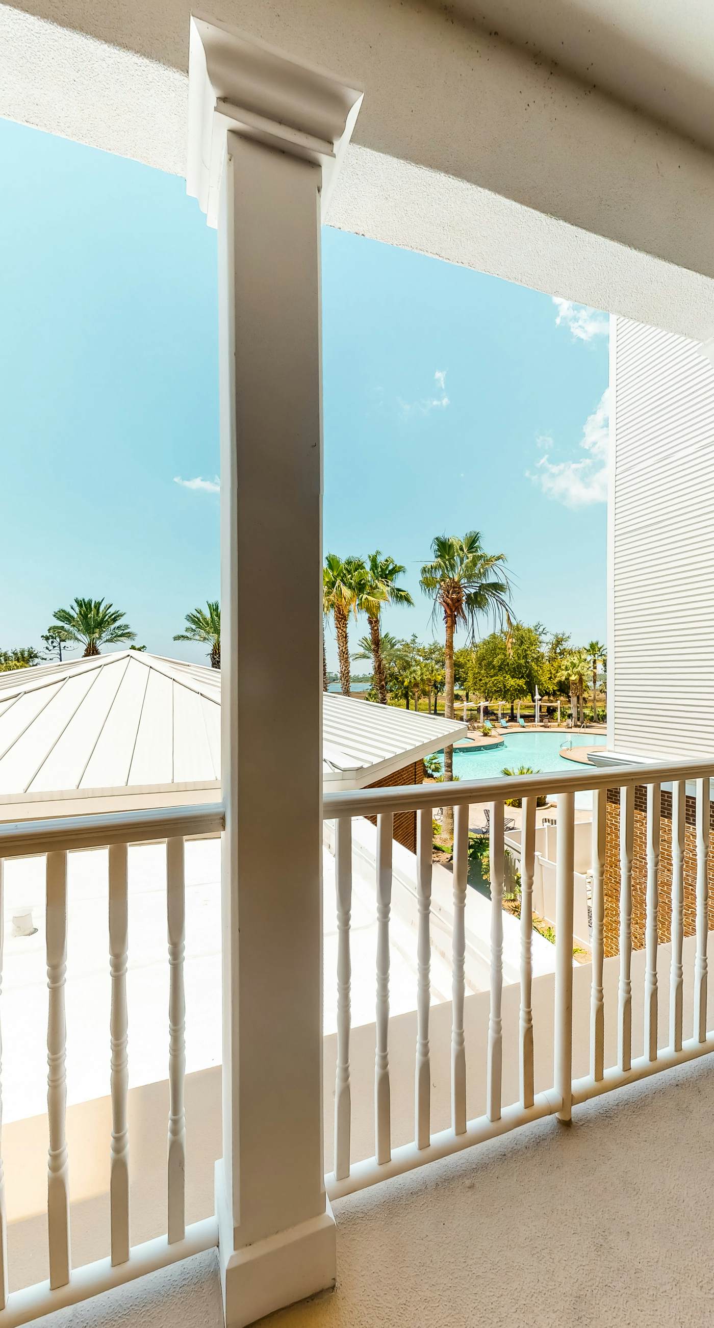 Waterfront Snowbird retreat with private balcony & pool - near the beach