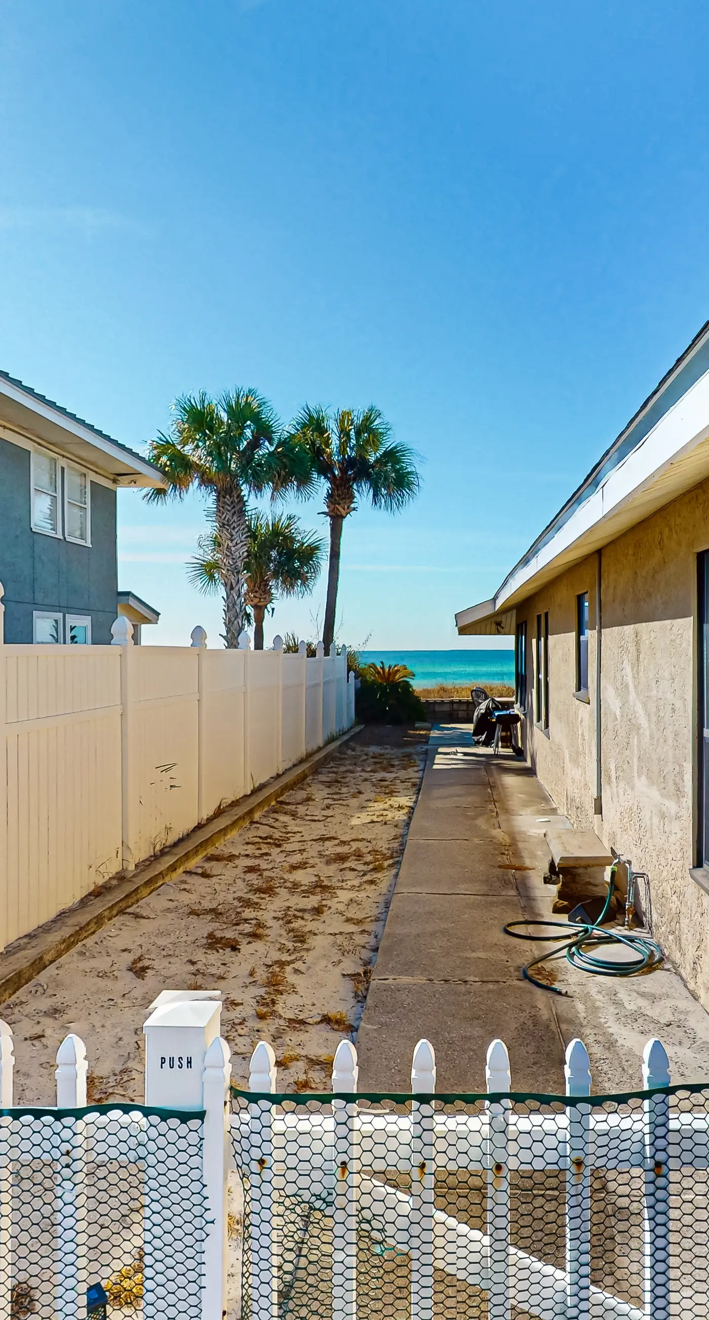 Large, snowbird & dog-friendly beachfront home w/WiFi & patio - steps to sand