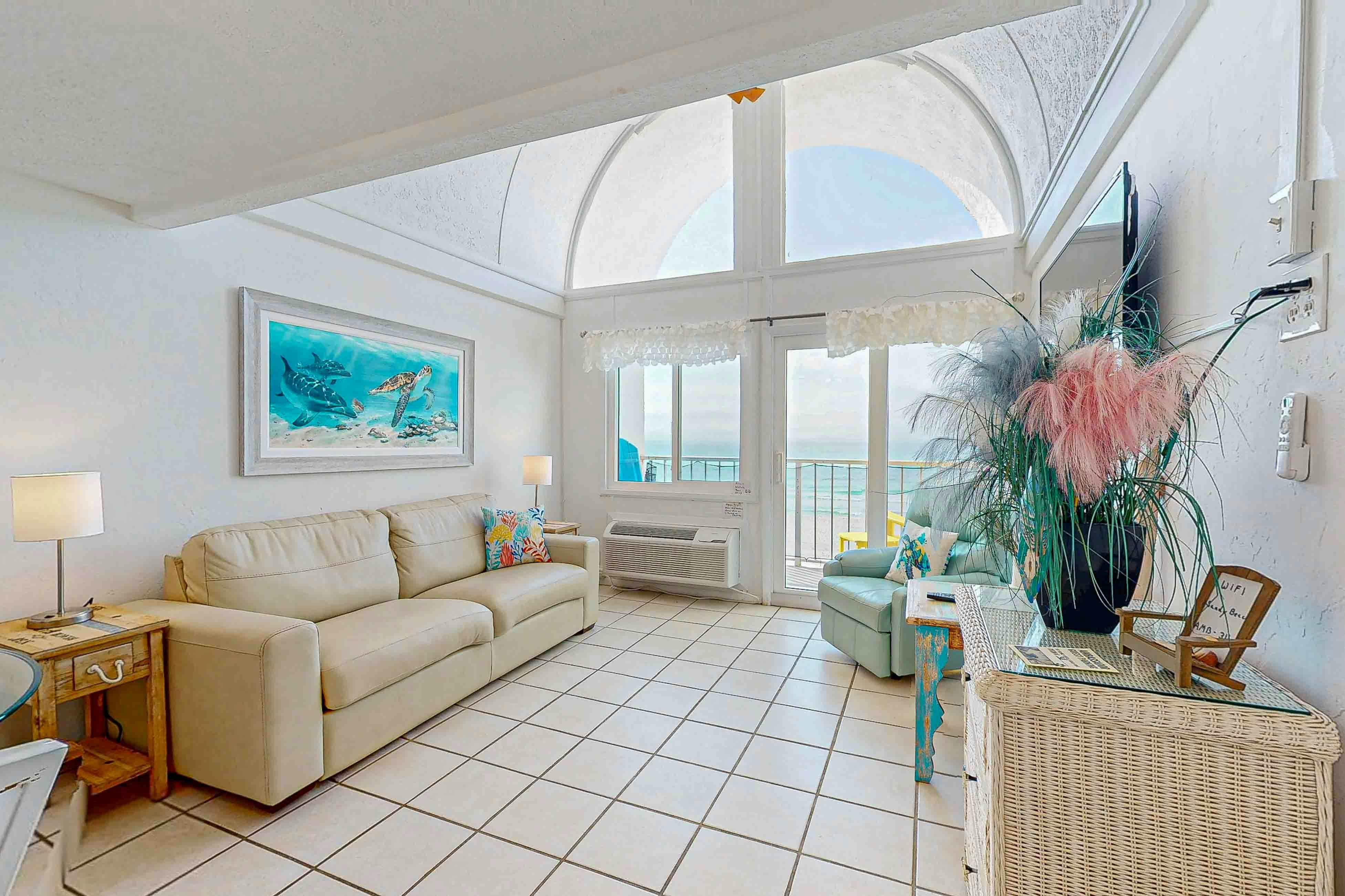 Dog-friendly beachfront condo with pool, hot tub, AC, & Gulf views