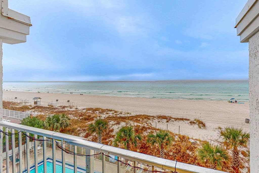 Dog-friendly beachfront condo with pool, hot tub, AC, & Gulf views
