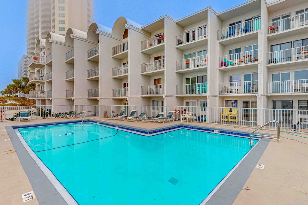 Dog-friendly beachfront condo with pool, hot tub, AC, & Gulf views