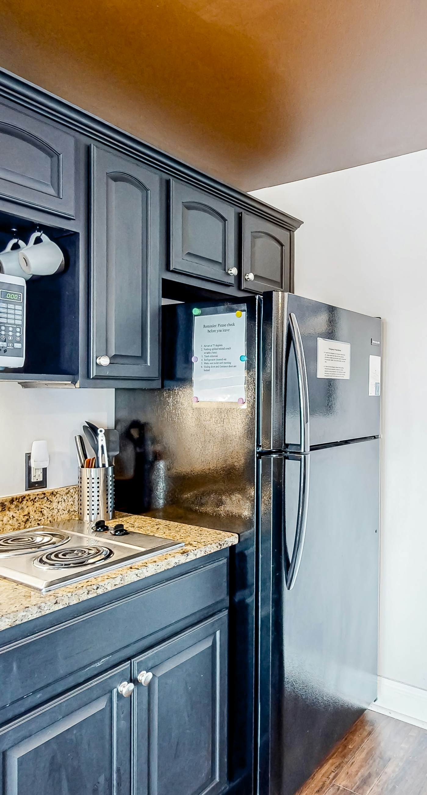 Water-view condo with on-site pool, hot tub, beachfront access, & sports courts