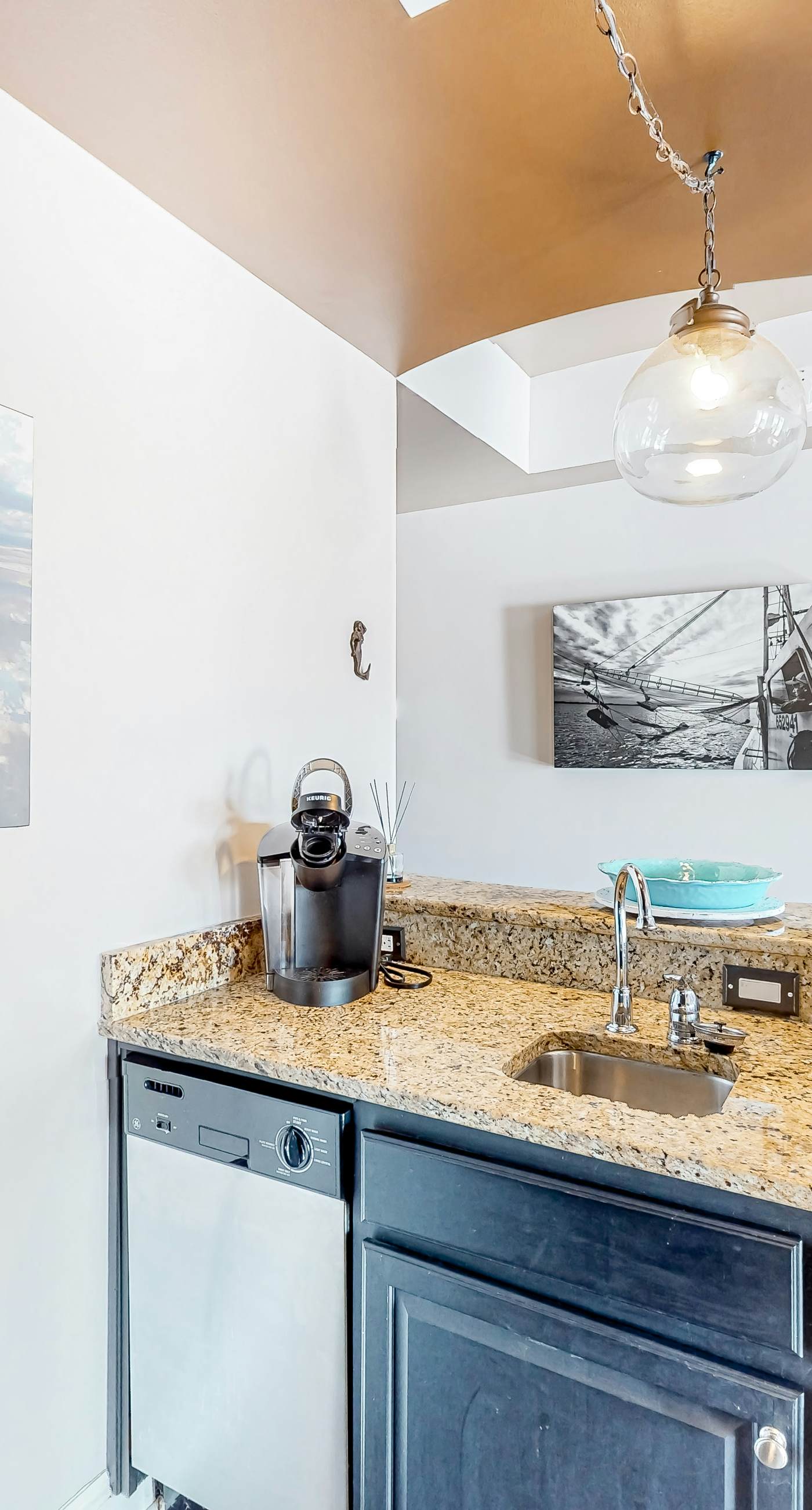 Water-view condo with on-site pool, hot tub, beachfront access, & sports courts