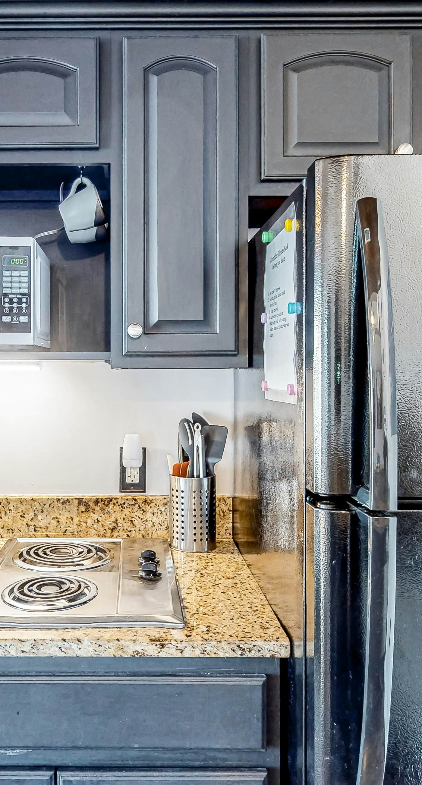 Water-view condo with on-site pool, hot tub, beachfront access, & sports courts