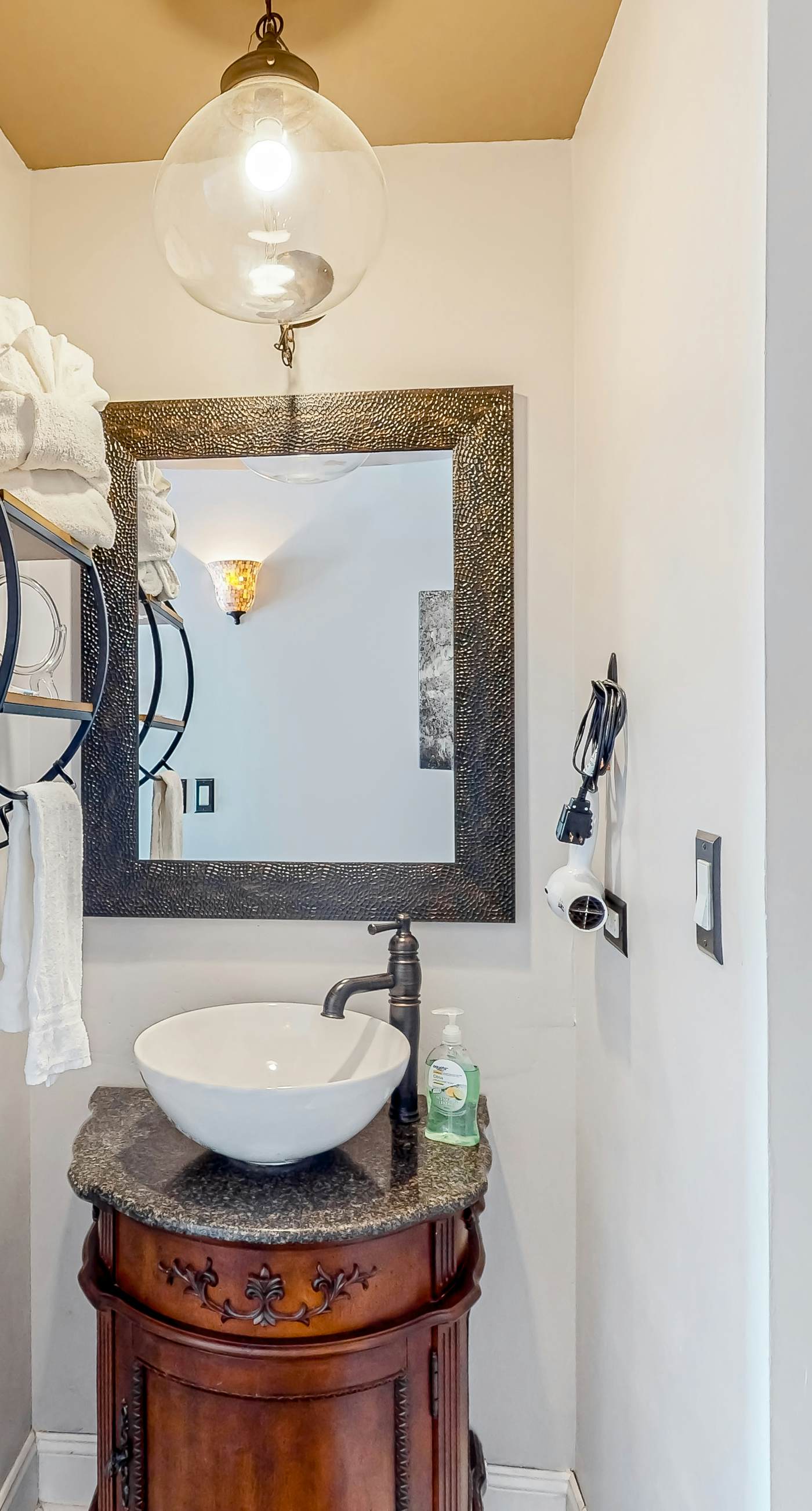 Water-view condo with on-site pool, hot tub, beachfront access, & sports courts