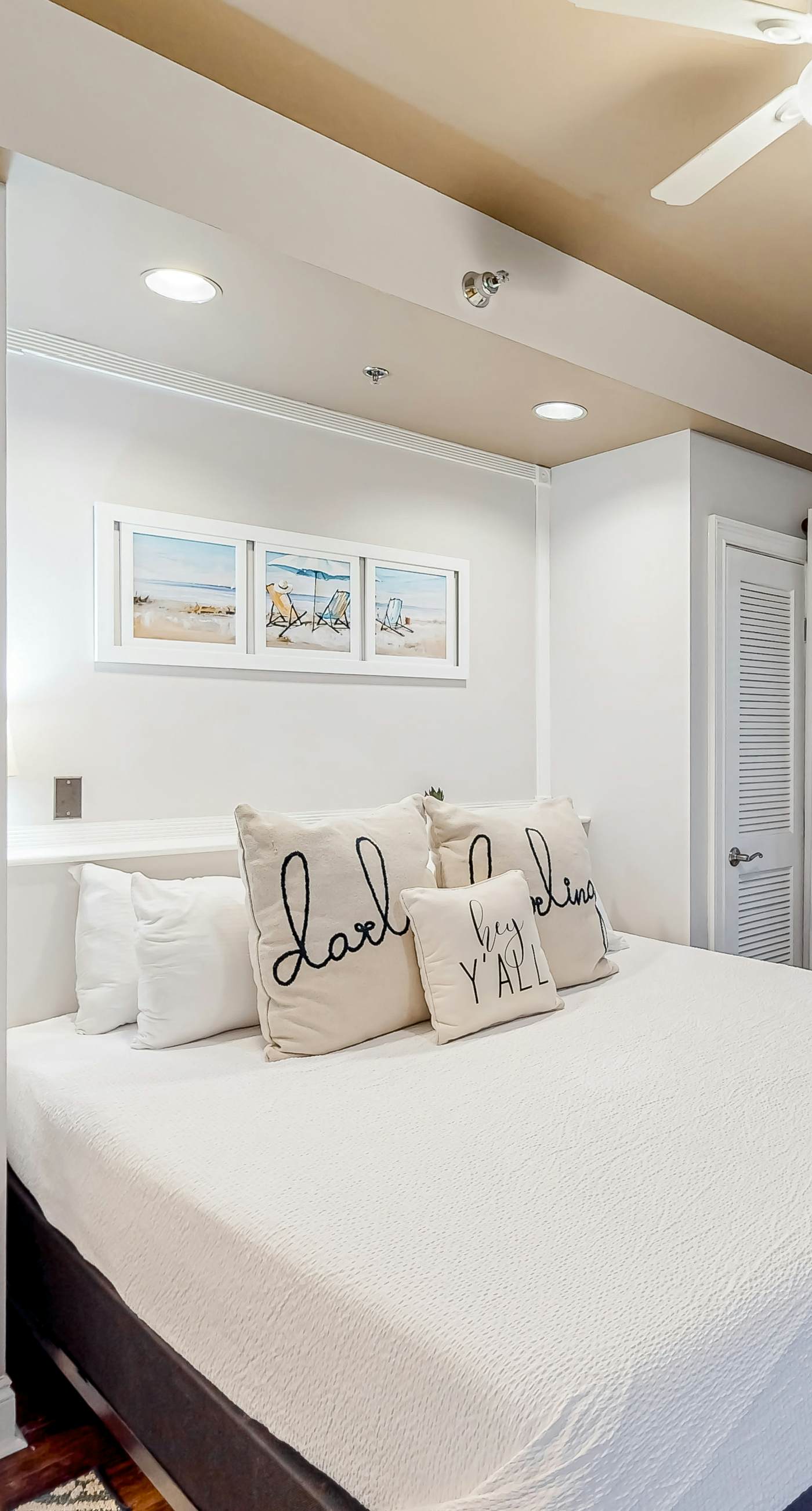 Water-view condo with on-site pool, hot tub, beachfront access, & sports courts